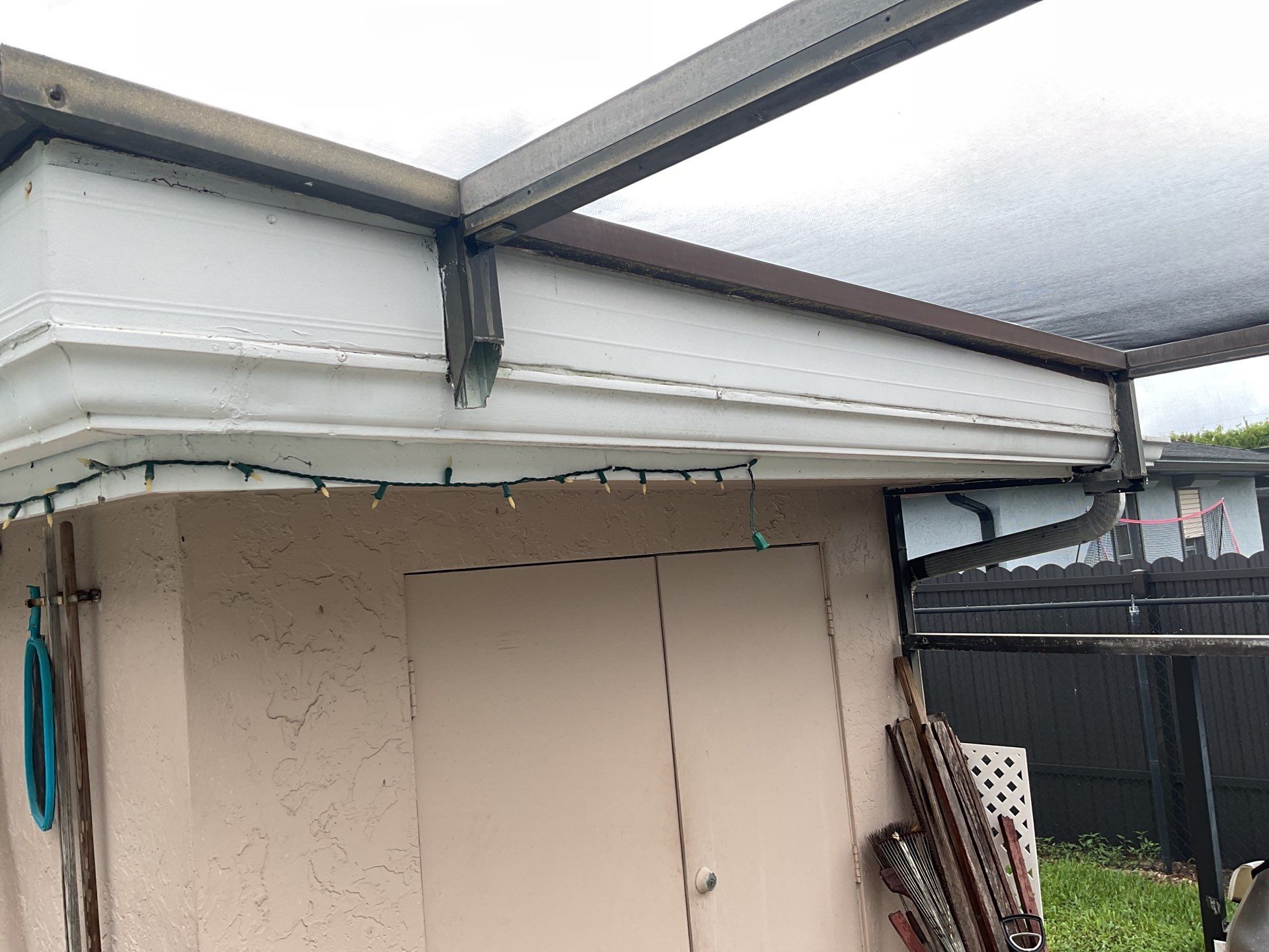 White Seamless Gutters and Splash Guards in Fort Myers FL by Gutter Professor by Gutter Professors