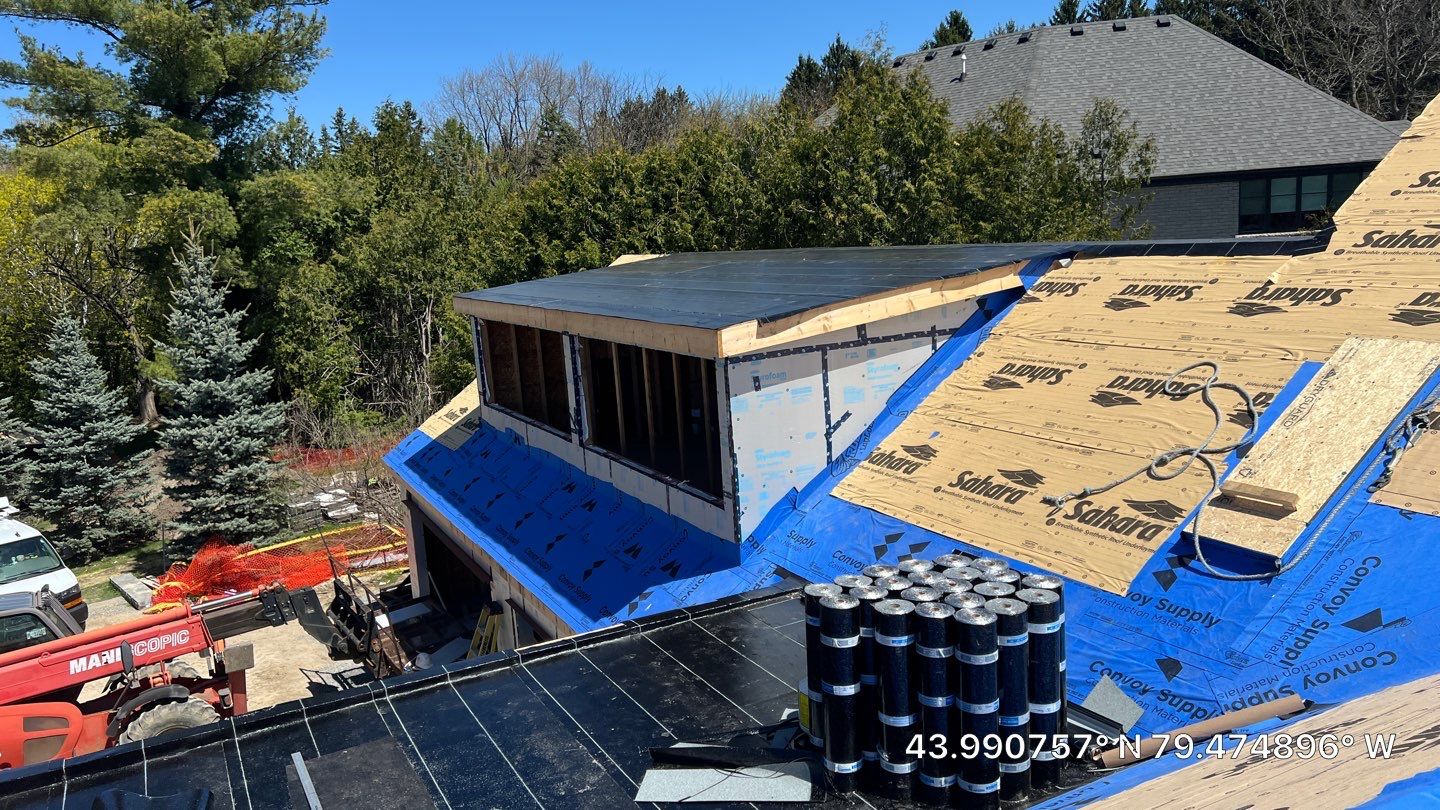 Custom Home Jet Black 24 GA Standing Seam Roof  by Jay Carter Roofing & Sheet Metal