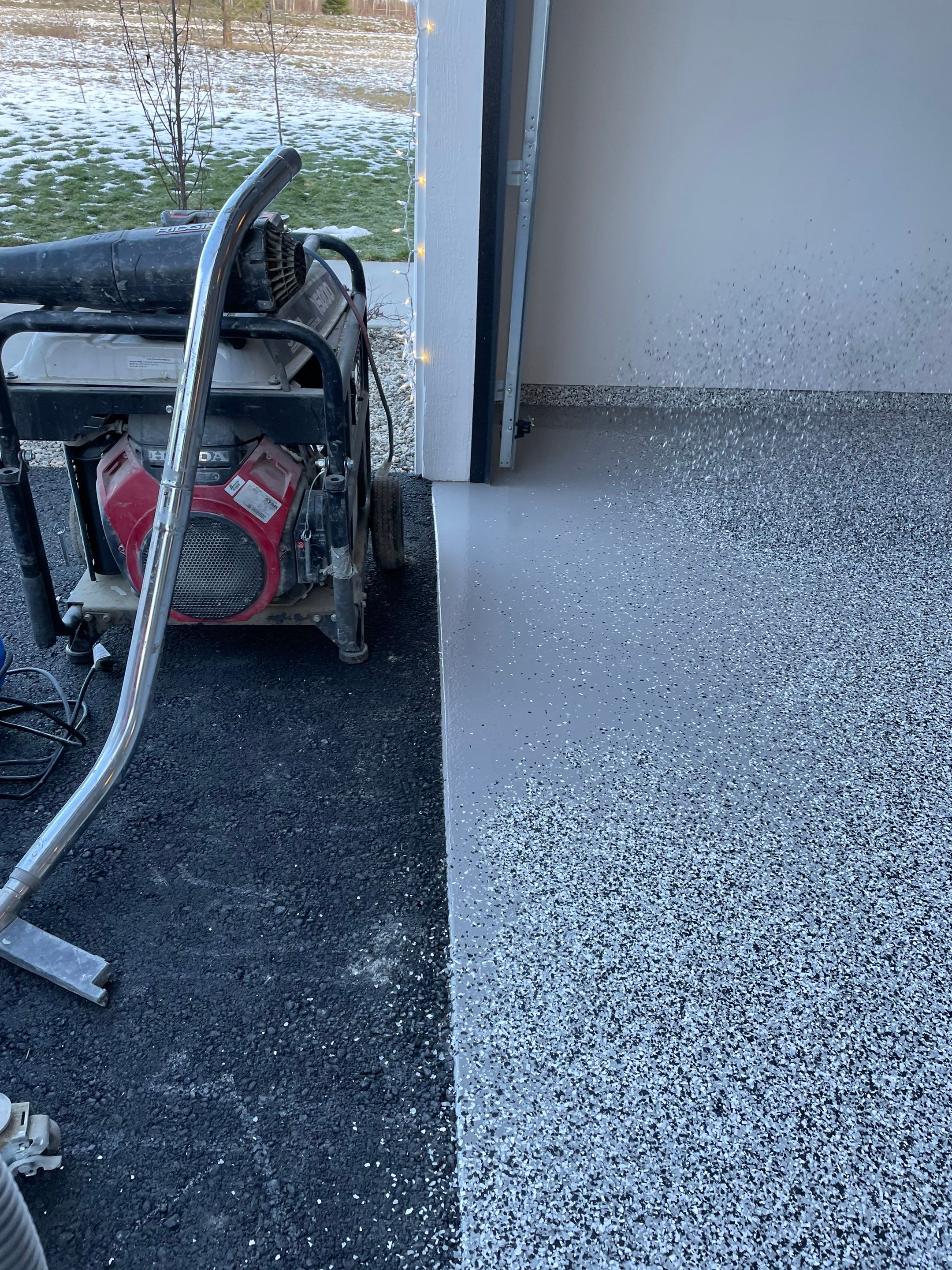 Garage Transformation using Domino and The Penntek Evolution System by Croc Coatings, LLC