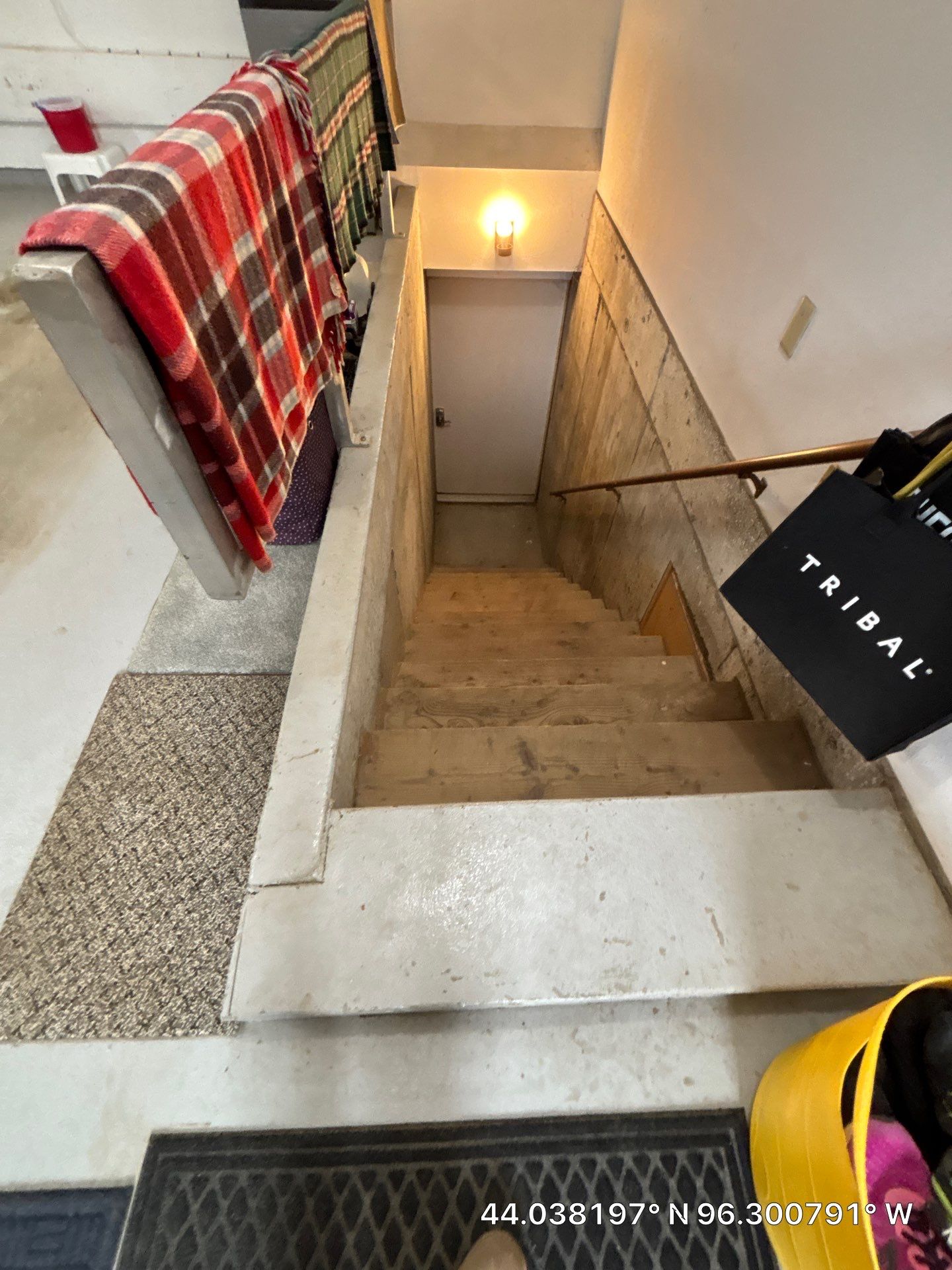 Custom Polyaspartic Garage Floor and Stairwell Coating in Pipestone by Select Painting, Coatings & Garage Cabinets