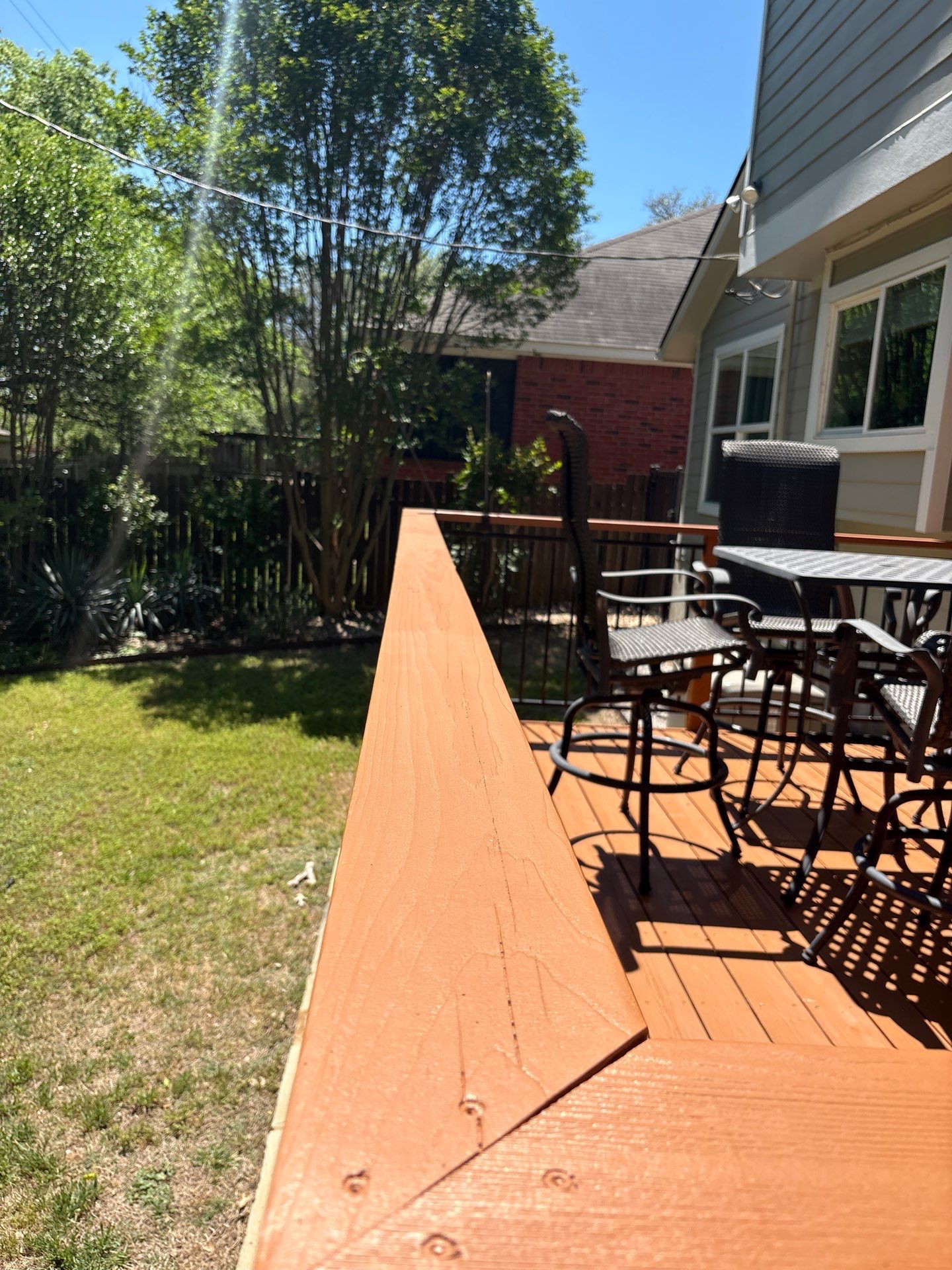 Back Deck Repainting Project in Austin, TX by Kstylez Roofing & Construction