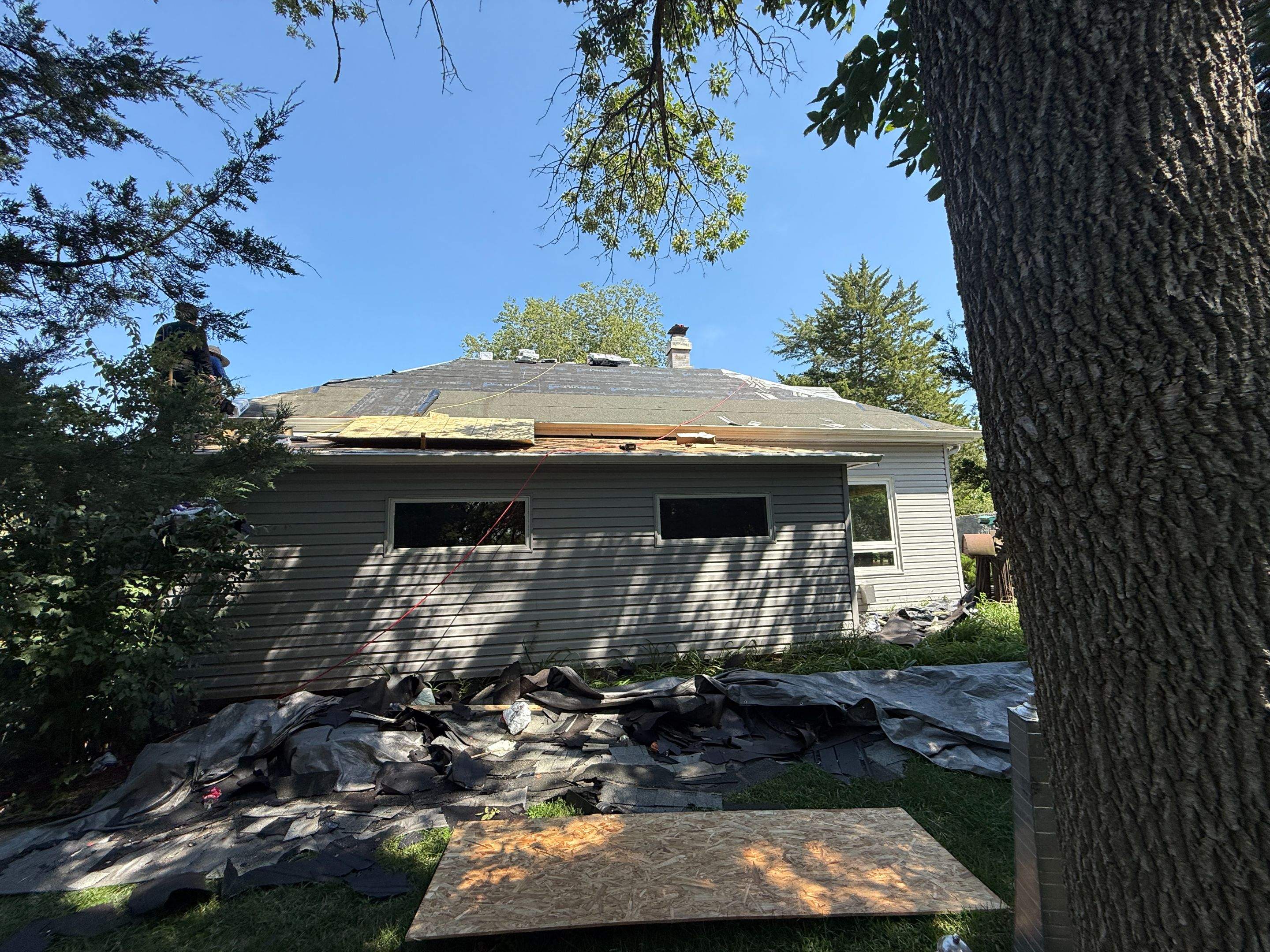 Asphalt Shingle and EPDM Membrane Roof Installation in Mineola by Star Home