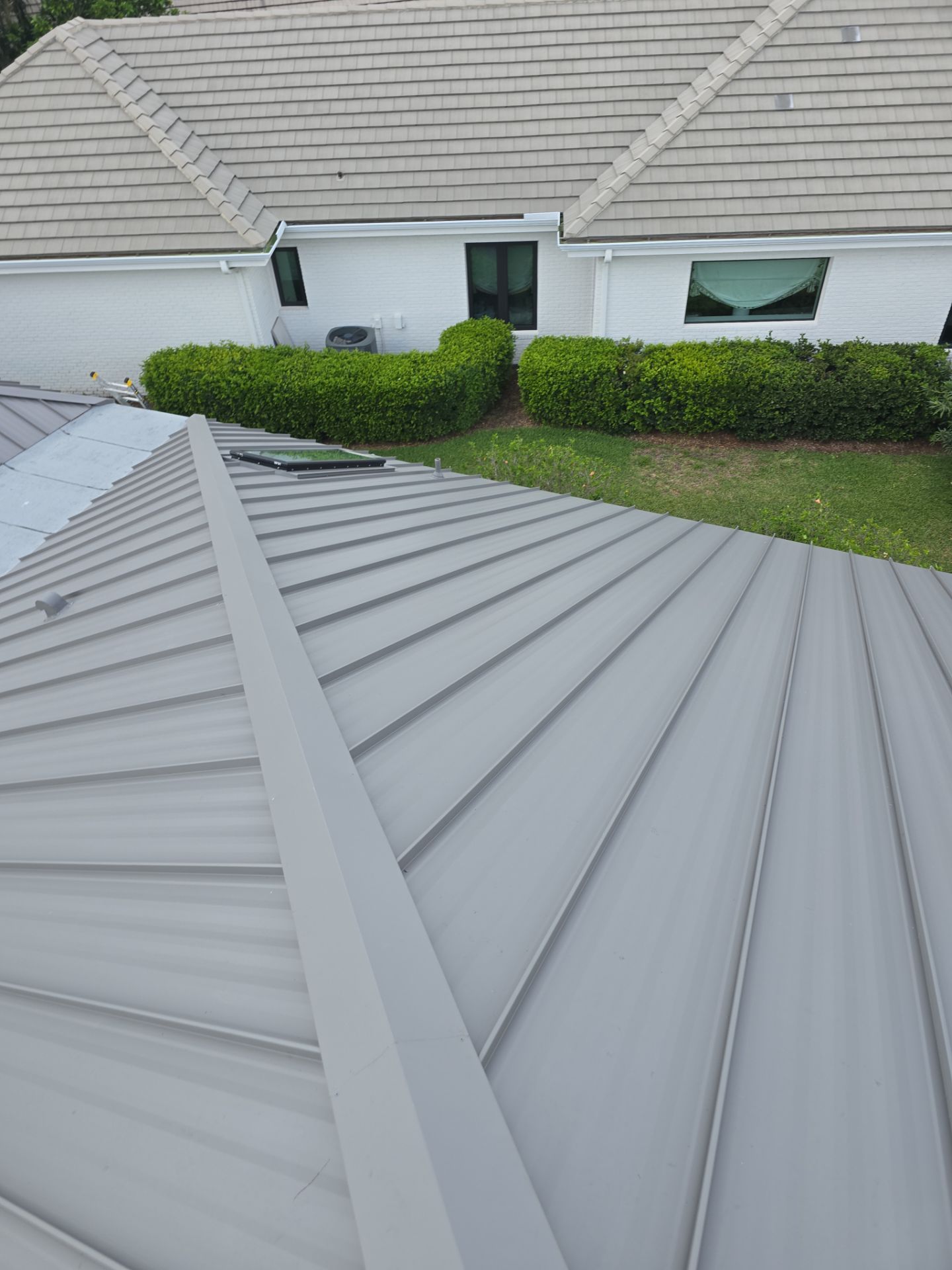 Kynar (Color Coated) 1.5" Standing Seam Metal Roof Installation by Sailfish Roofing