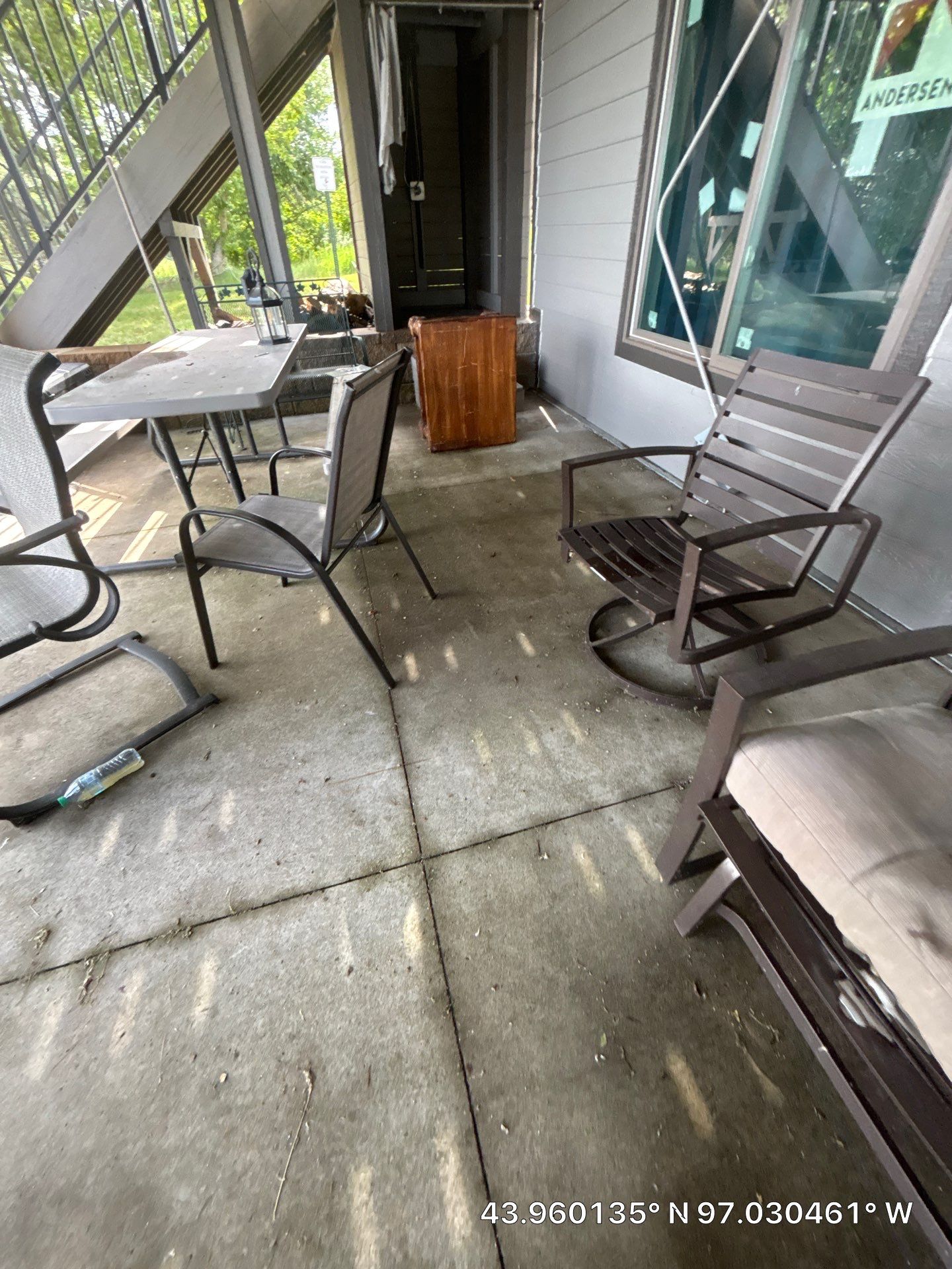 Lakefront Screened Patio Concrete Coating Installation in Wentworth by Select Painting, Coatings & Garage Cabinets