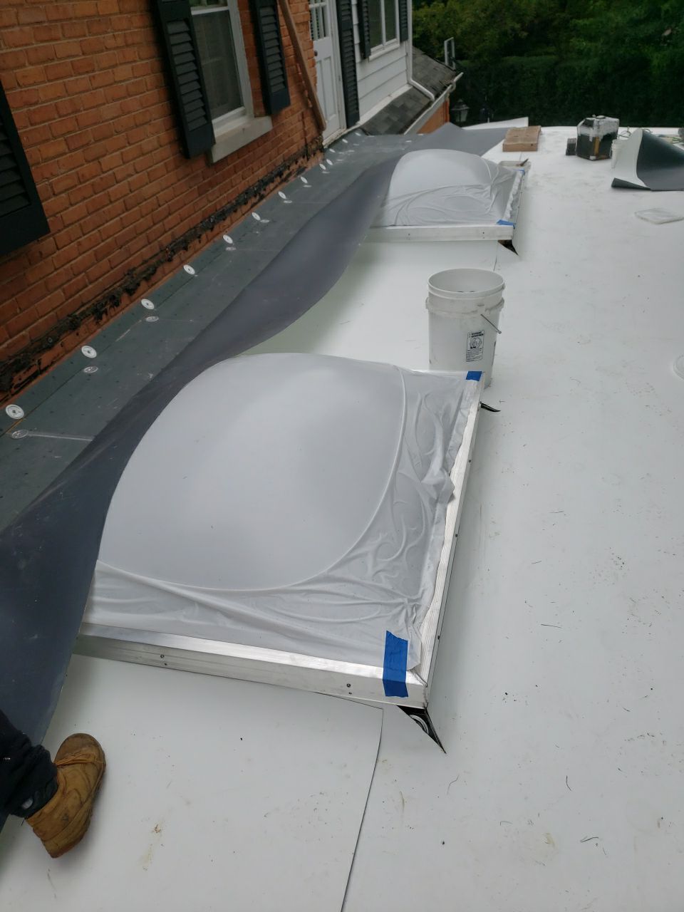 Flat Roof Replacement and Copper Gutter Installation by Custom Installations
