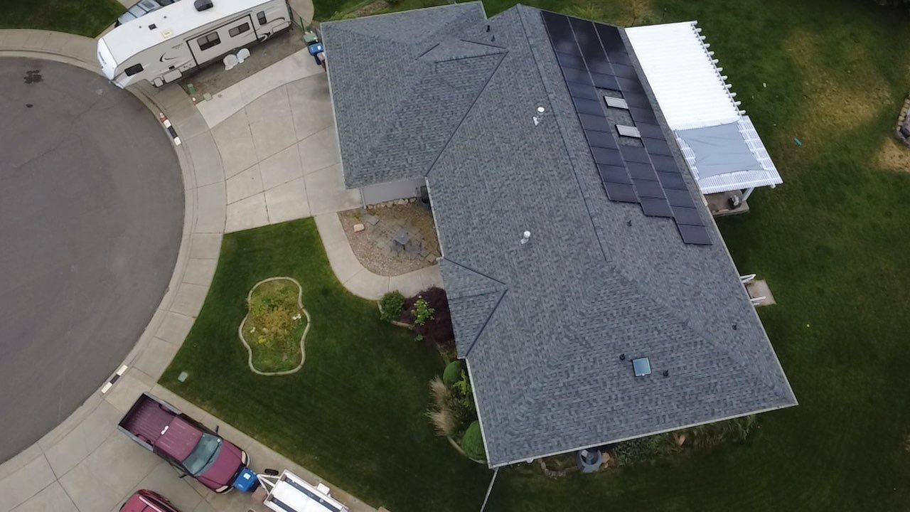 Spokane Residential Roof Replacement With Solar Panel and Skylight Integration N Portsmouth Ct Spokane, WA 99208  The Denali System - Certainteed Landmark® Shingle - Granite Gray by Alpine Roofing