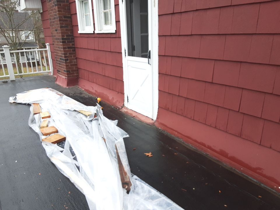 Residential Roof Replacement using Patio Roof by Absolute Roofing and Construction