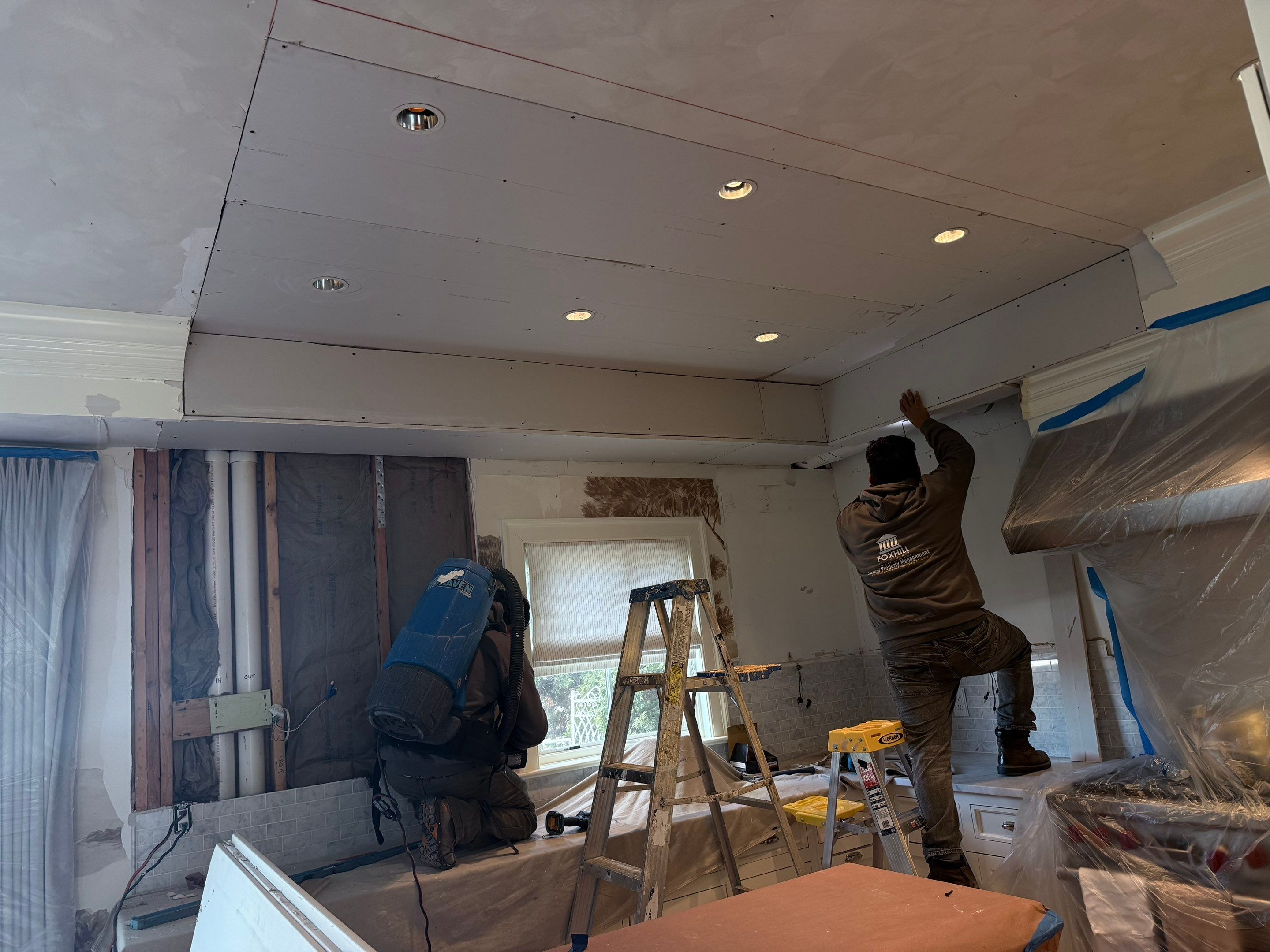 Water Damage Repairs in Luxury Kitchen and Primary Bathroom by Fox Hill Luxury Real Estate Services