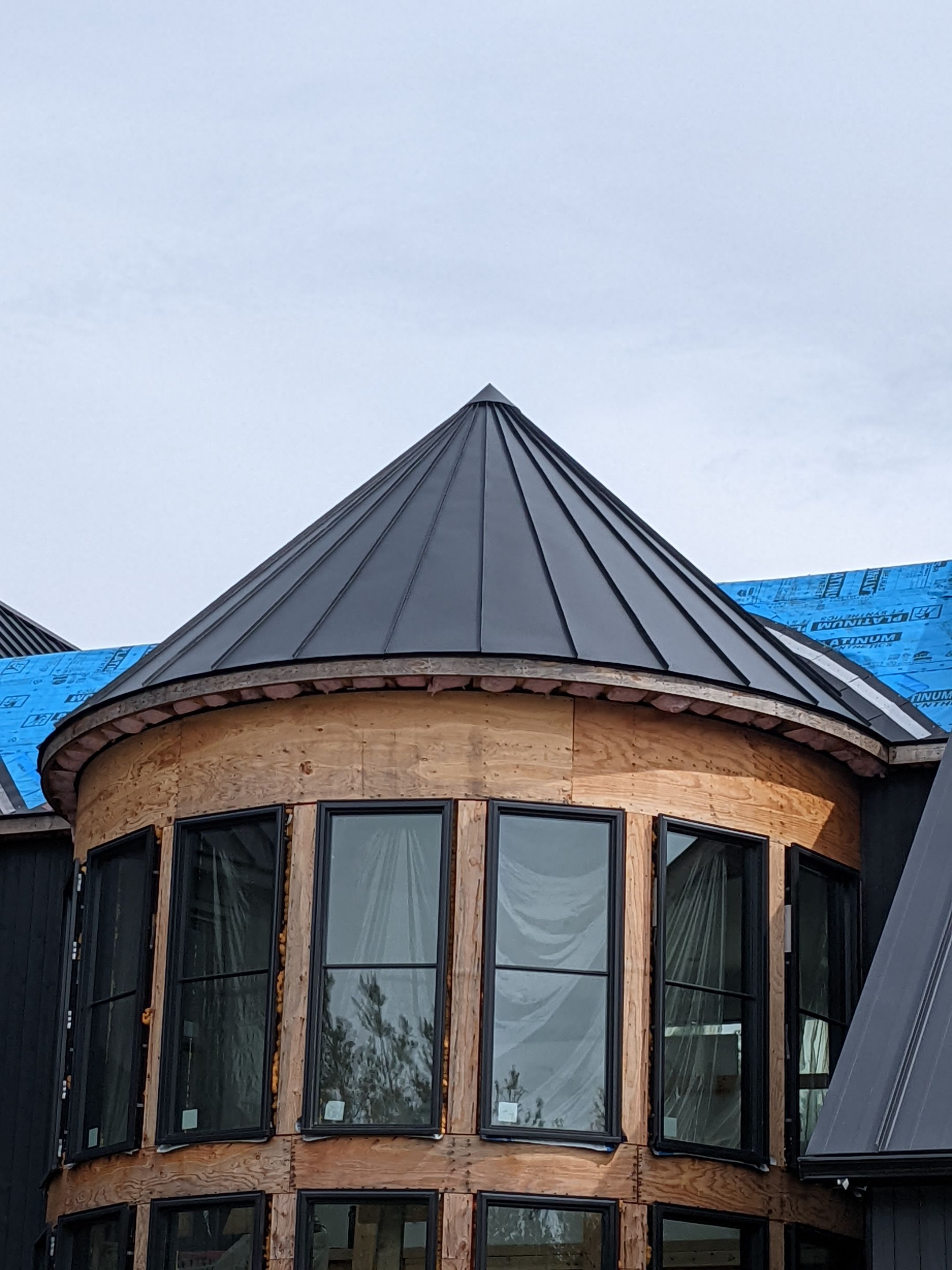 New Home Construction using 16" Standing Seam Panels by Jay Carter Roofing & Sheet Metal