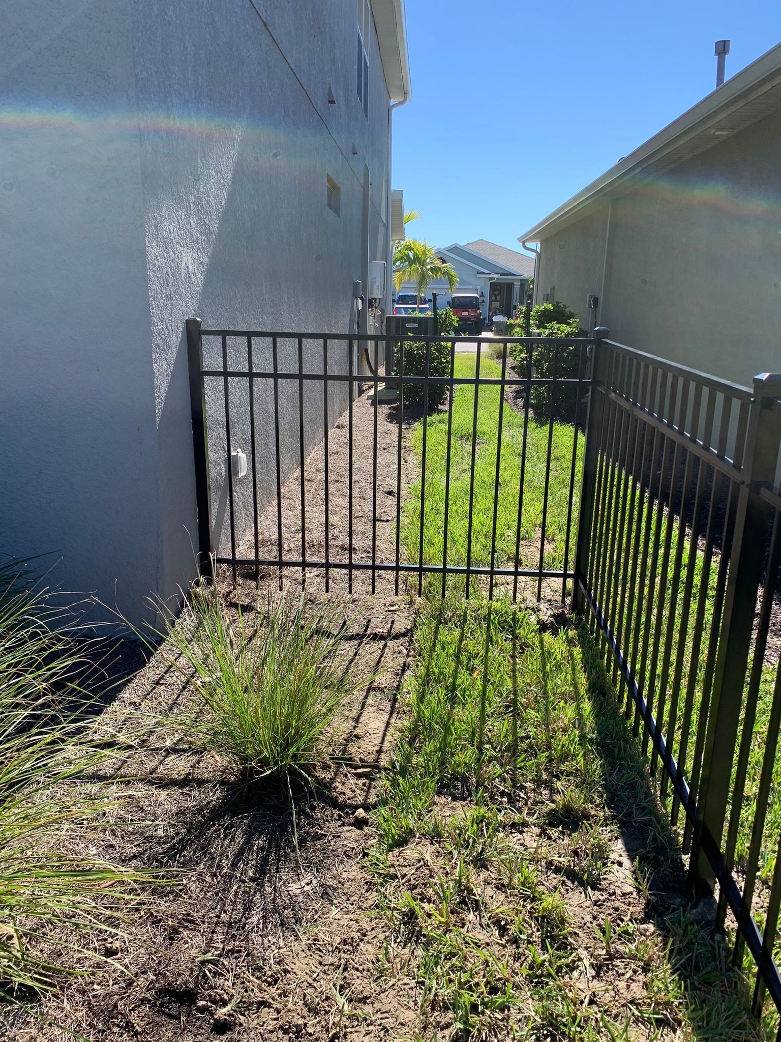 Aluminum Fence Installation using 4ft 3 Rail Black Aluminum Fence by Asap fence and gates, LLC