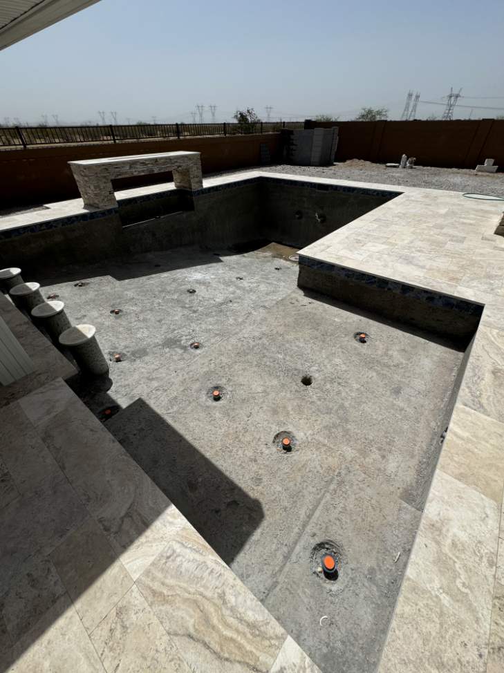 Pool build with custom water features & pergola by Modern Pools