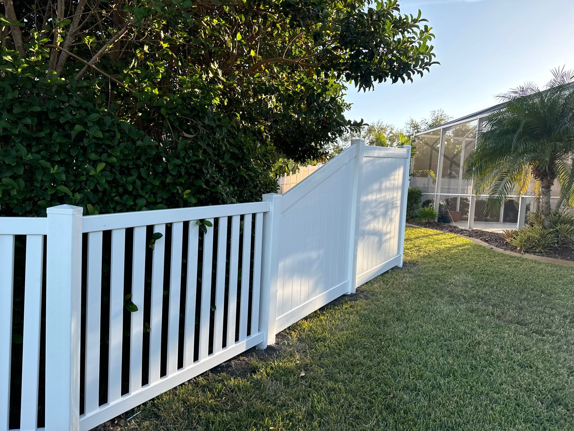 Vinyl Picket Fence Installation using 6Ft White Vinyl Privacy Fence with a 4Ft White Clearwater Picket Fence by Asap fence and gates, LLC