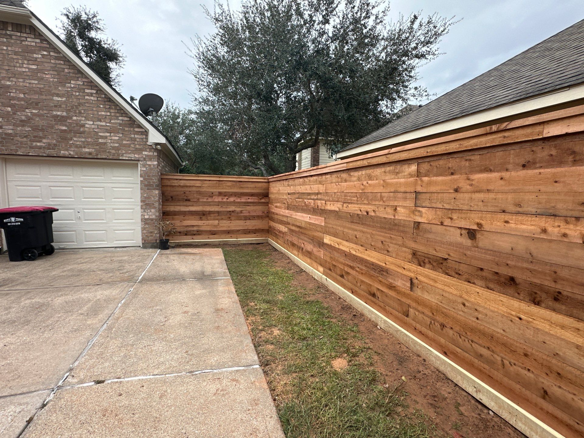 Fence Installation using Premium horizontal WRC by Tim's Fences