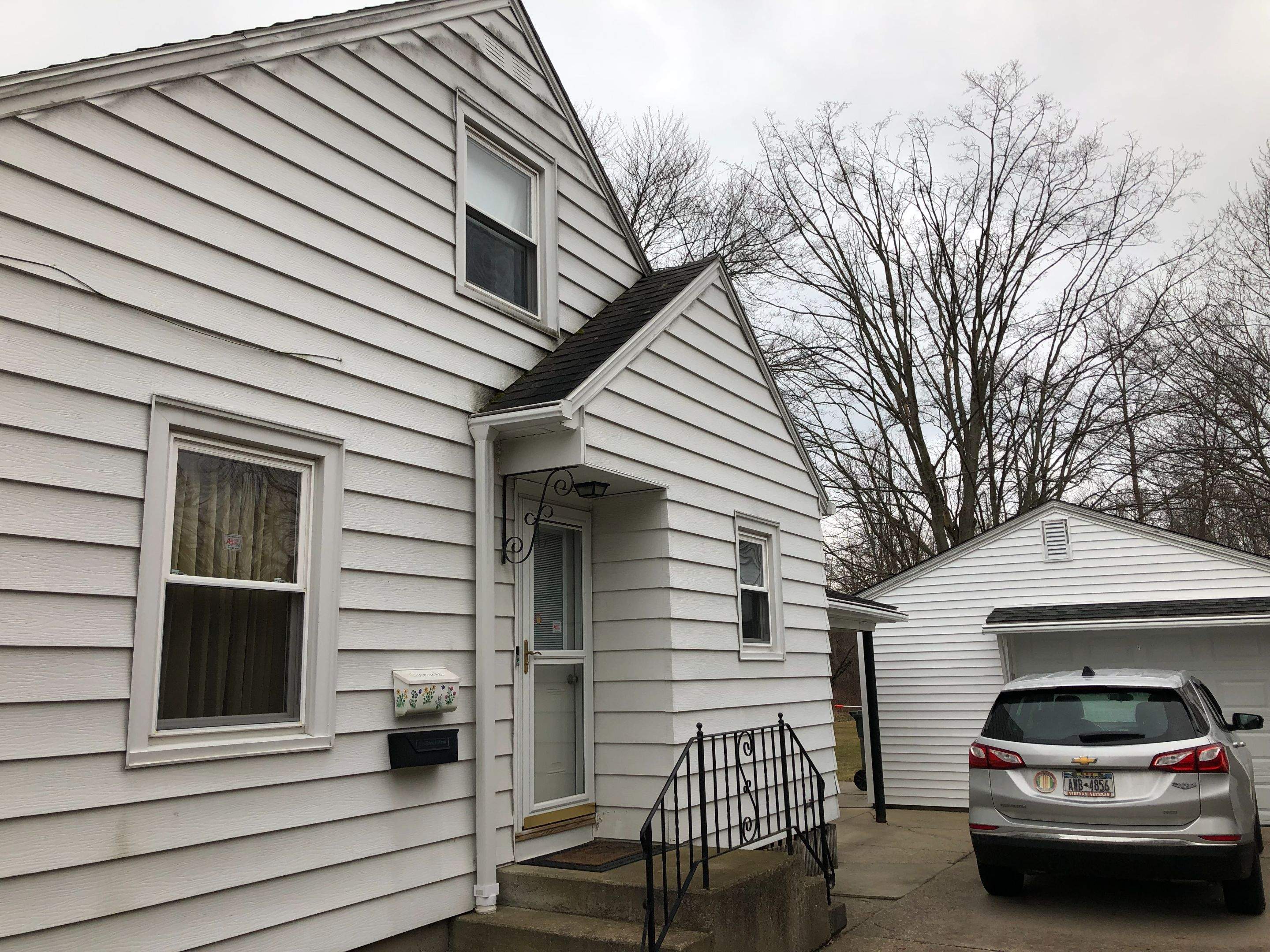 Exterior Renovations- Roofing, Siding, Concrete, and Railings  by Ivy Lea Construction