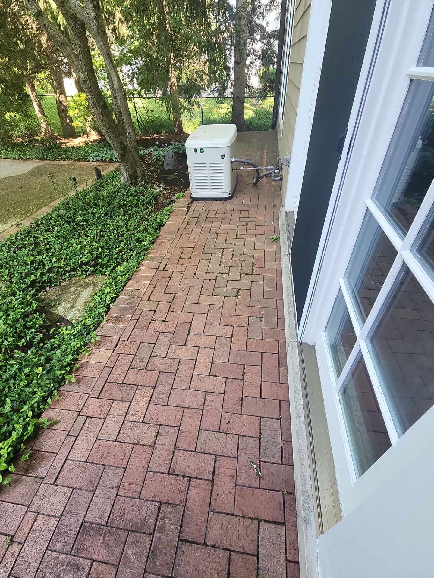 Highland Park brick cleaning by Northern Power Washing LLC.