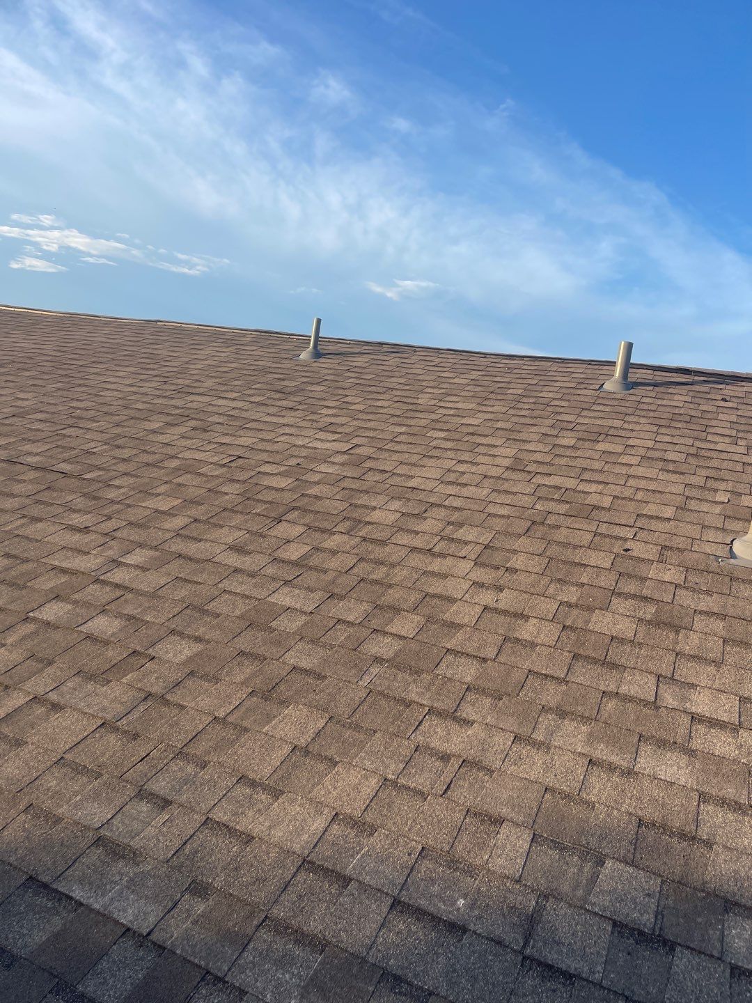 Residential Roofing Installation using Roof Replacement by American Roofing & Construction LLC