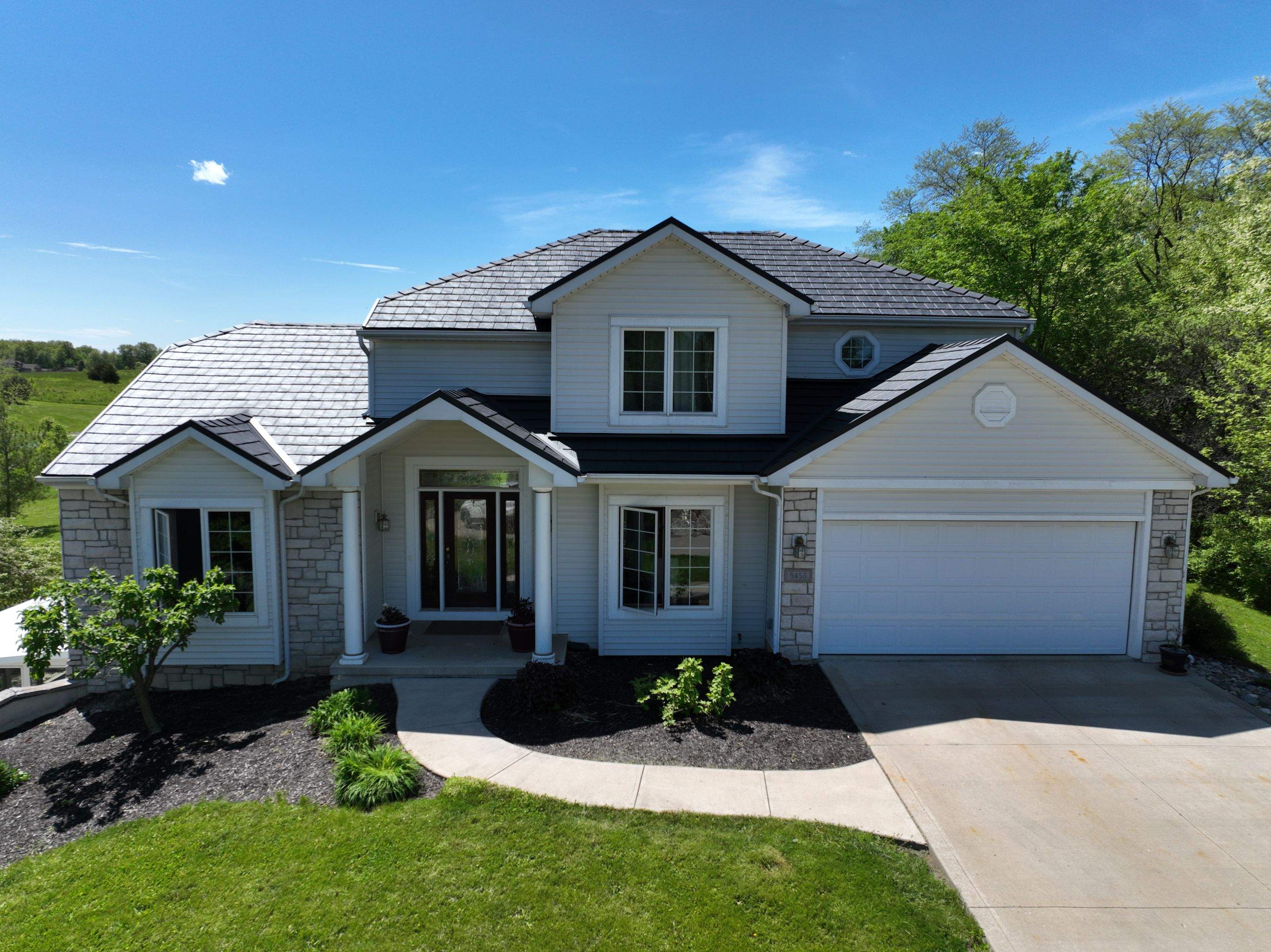 Residential Roofing Installation using Vic West Nothridge Slate by 4Ever Metal Roofing