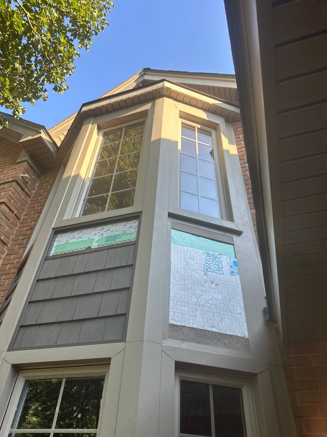 Roof Replacement using Owens Corning Peppercorn and Siding Replacement using Ascend Charcoal Smoke by 180 Contractors