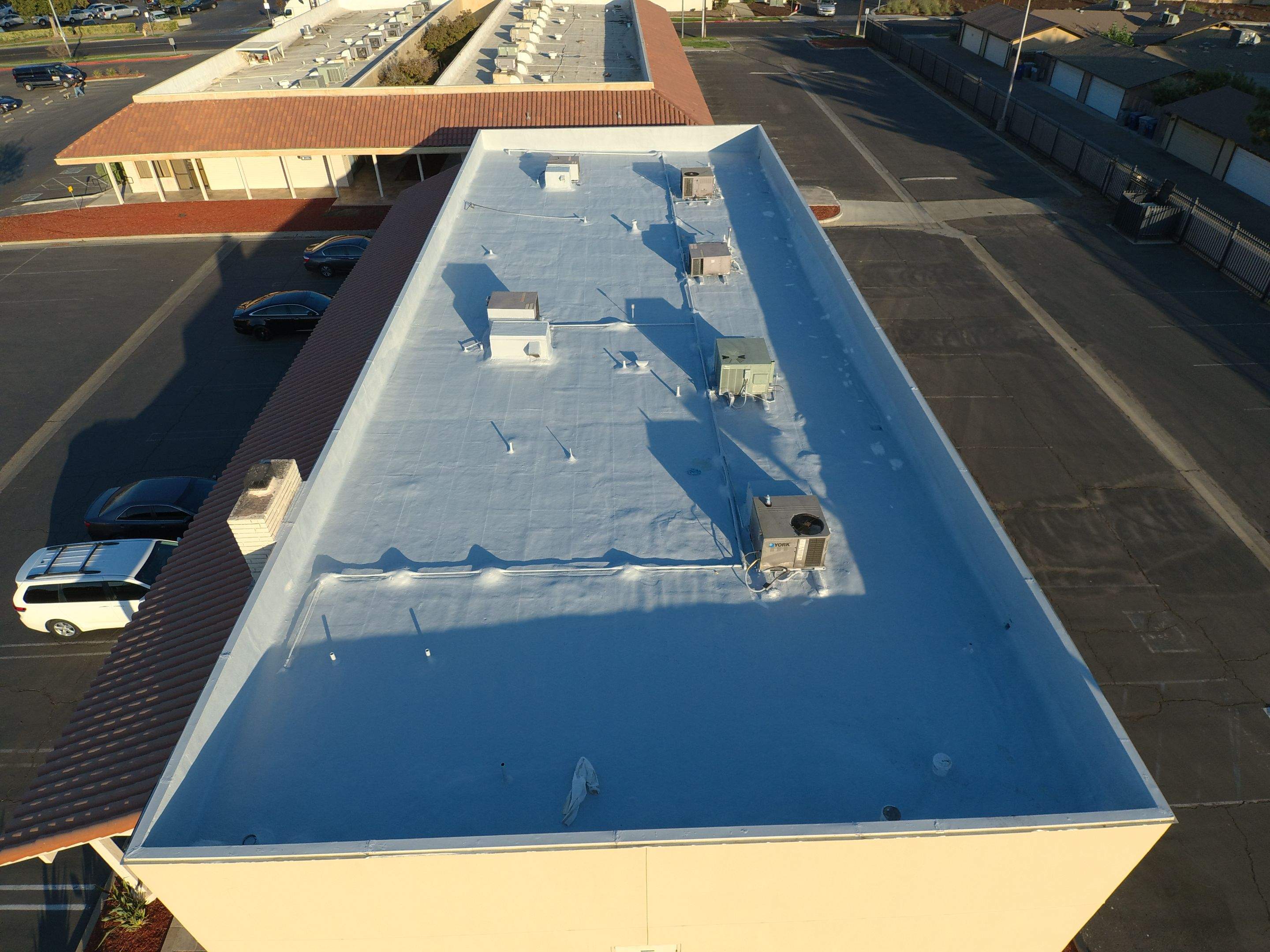 Reburbish existing spray foam job by Straight Edge Roofing Inc