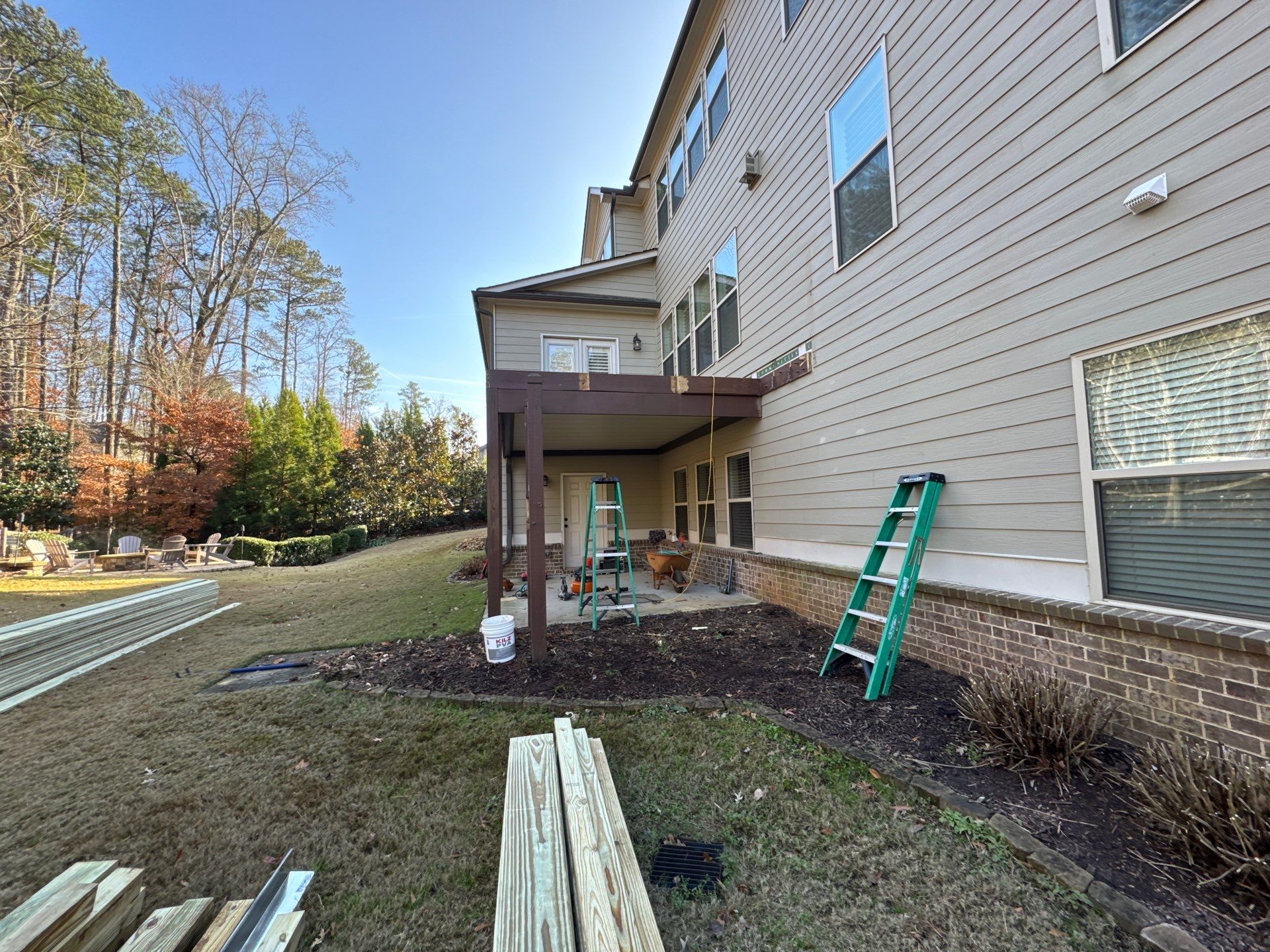 Custom Pressure-Treated Deck with Metal Balusters in Marietta by Swift Home Renovations