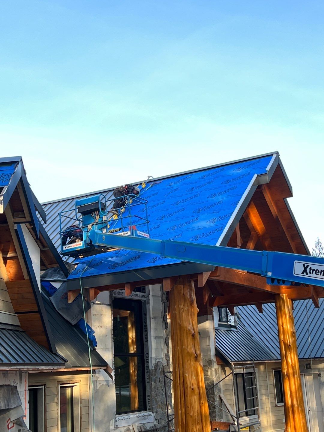 Residential Roofing Installation using 12" Prolok metal by Top Notch Roofing Inc