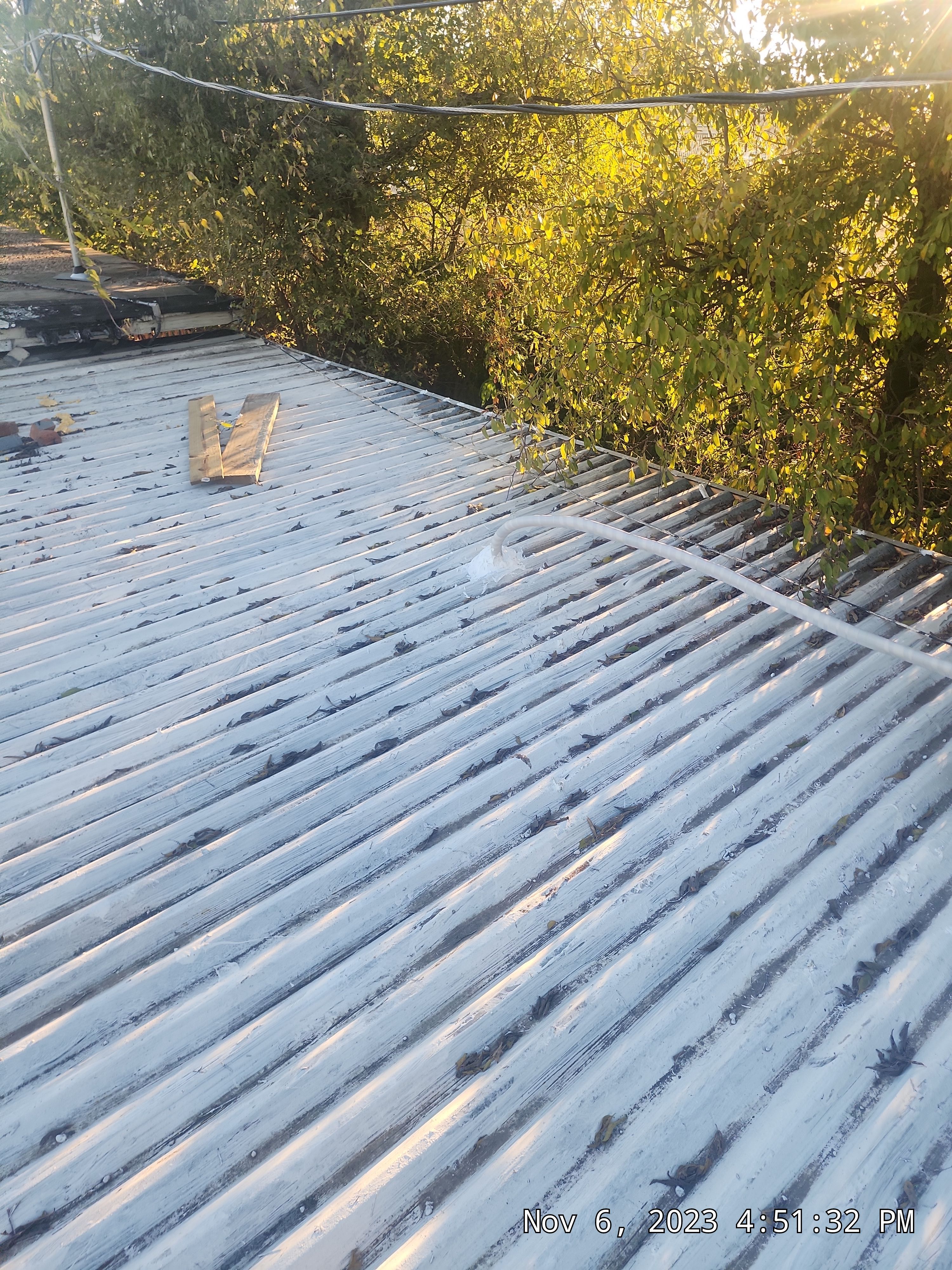 Commercial roofing overlay using GAF TPO over an old ballast roof by Becker Roofing and Exteriors