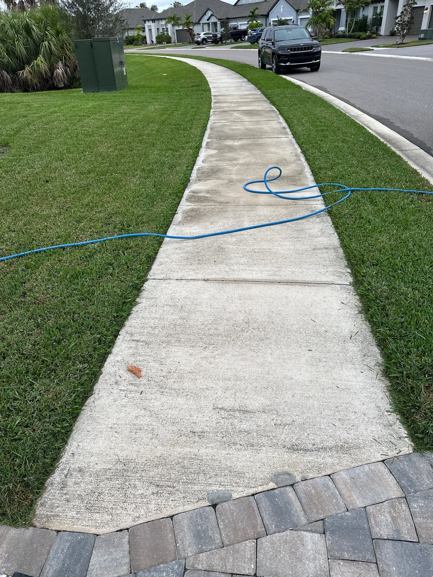 House Wash, Paver Driveway & Sidewalk Cleaning + Sanding & Sealing in Trevesta Community, Palmetto, FL by Sunshine AquaWash