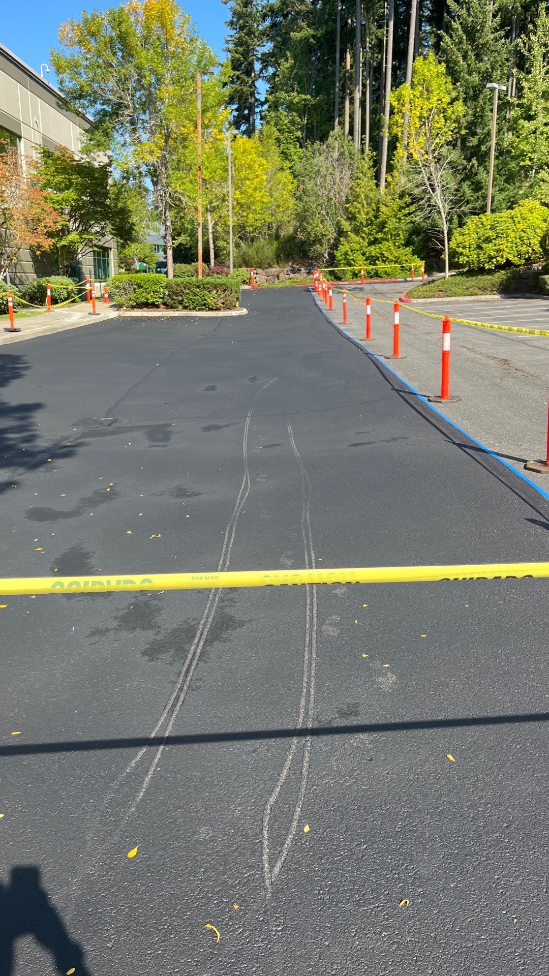 Kidder Matthews | Parking Lot Sealcoating & Striping with Concrete Curb & Patch Repairs  by Jireh Asphalt & Concrete Inc 