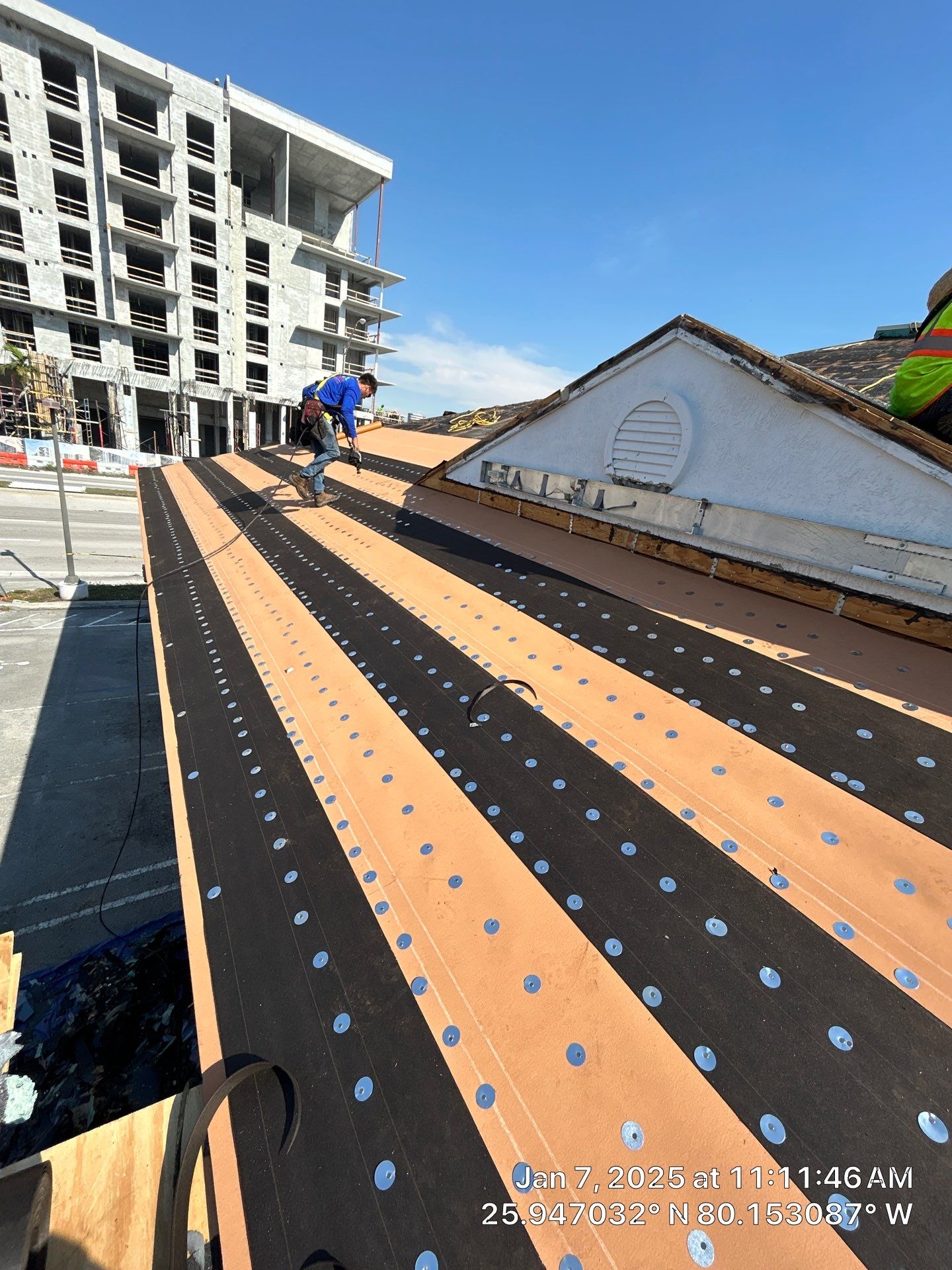 COMMERCIAL REROOF 24 GUAGE MEDIUM BRONZE 1-1/2" MECHANICAL SEAM "ZEBRA METHOD" by Earl W. Johnston Roofing 