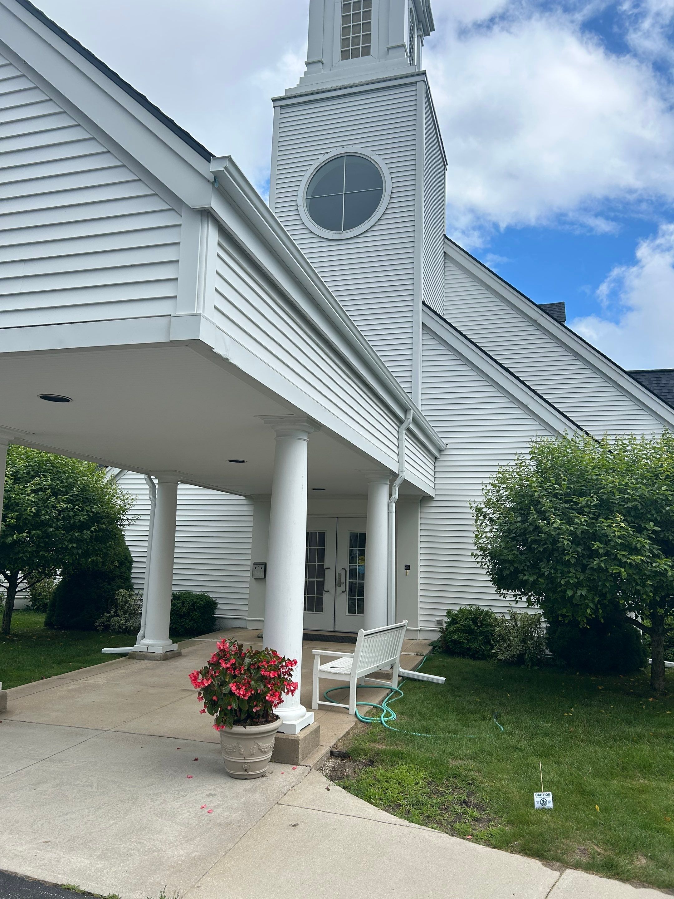 Gutter and Gutter Screen Installation for Harbor Springs Church by Rainbow Seamless Systems