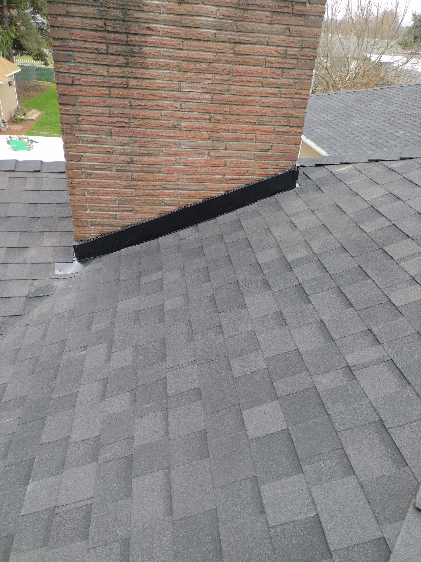 Residential Roofing Installation using IKO Dynasty (Color: Granite Black) by Orezona Building & Roofing Company, Inc.