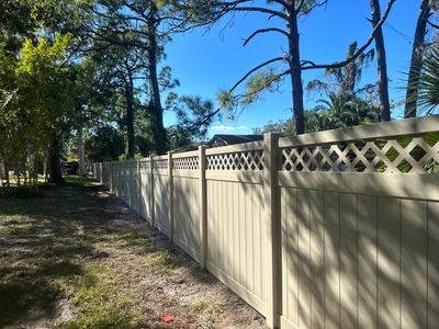 Vinyl Fence Installation using 6Ft Tan Vinyl Privacy Fence with Lattice Top