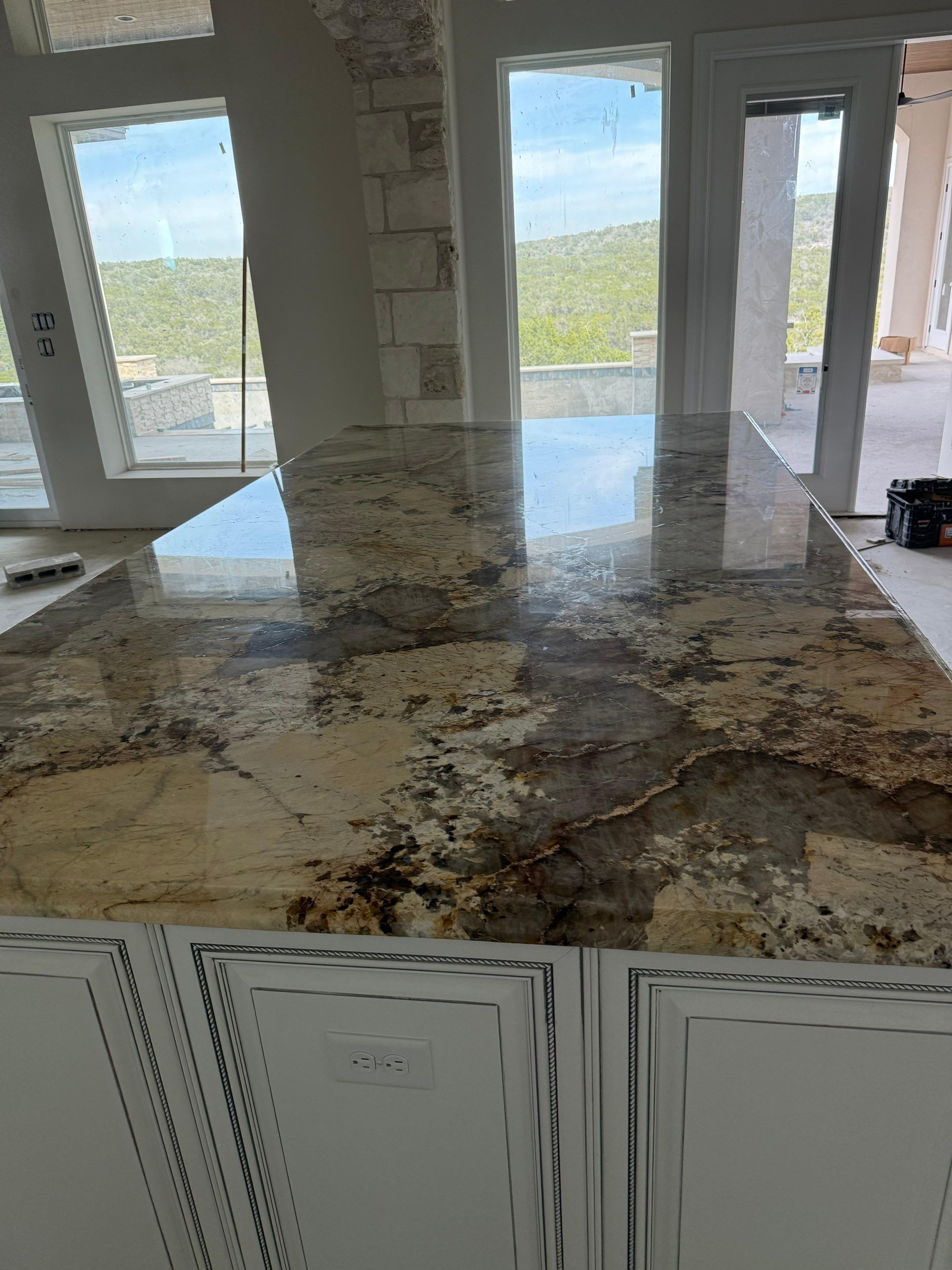 Kitchen and Bathroom Remodel Featuring Custom Stone and Tile in Mico by Mena stone surfaces