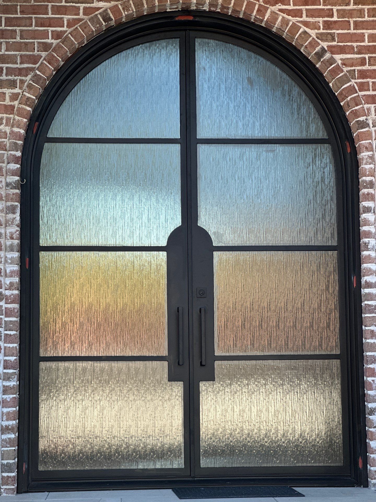 Custom Arched Metal Entry Door Installation in Plano by Solara Custom Living