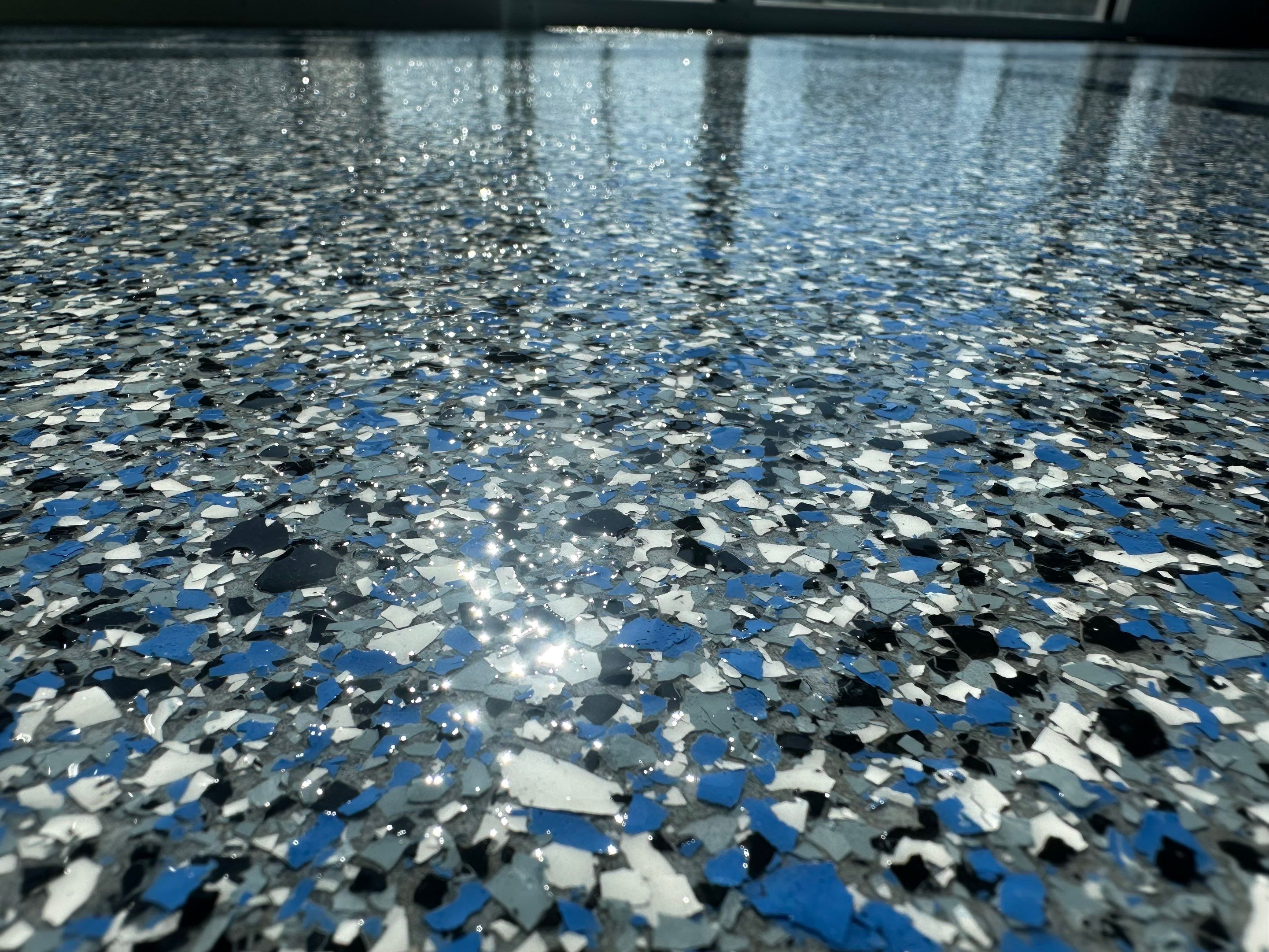 Commercial Epoxy Floor Coating for Stadium Viewing Suites in Sioux Falls by Select Painting, Coatings & Garage Cabinets