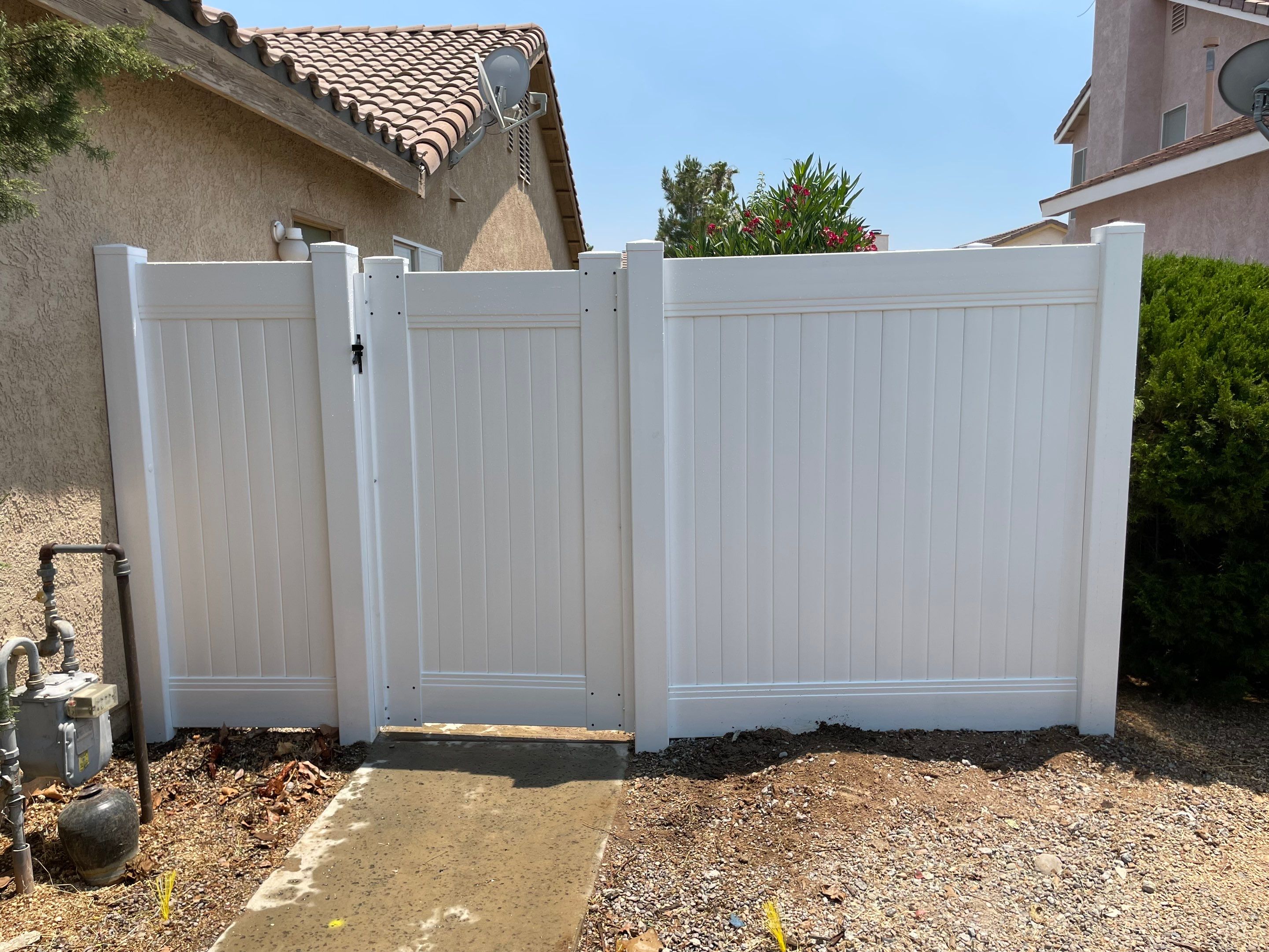 Gate installation using Vinyl by Fence Guys Inc. 