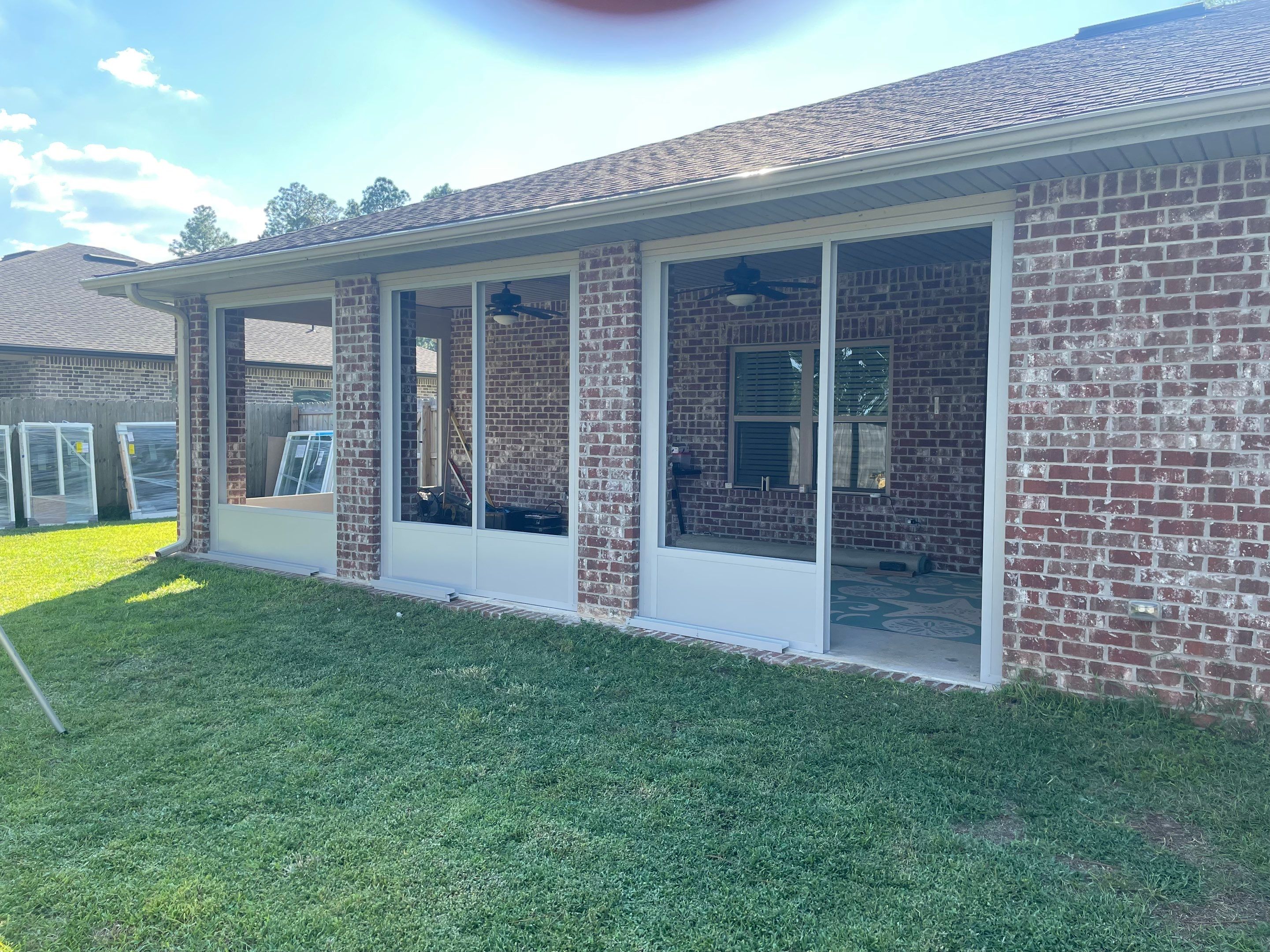 Glass Room Under Existing Patio Cover by Titan Sunrooms