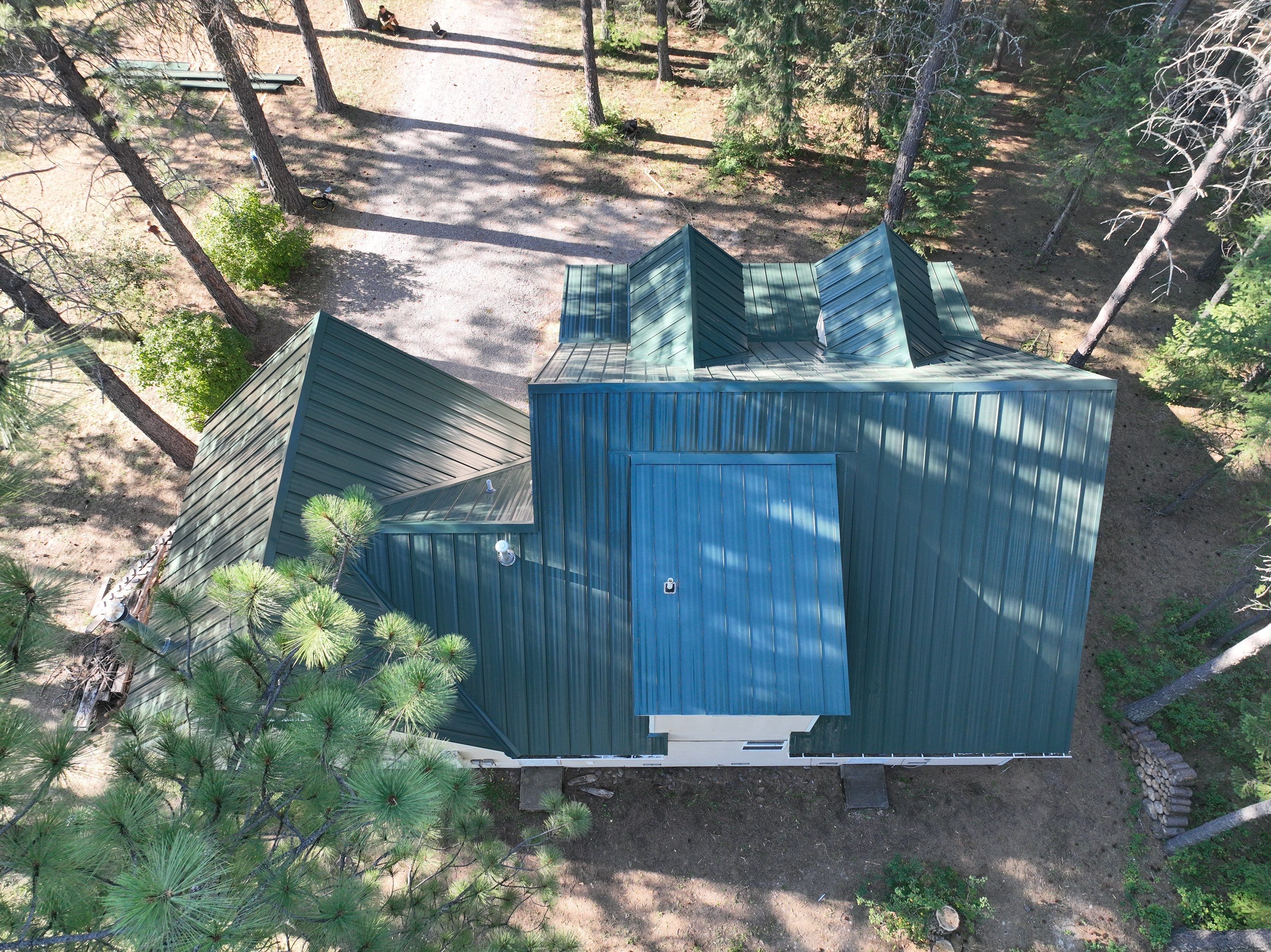 Green Snap Lock Standing Seam  by Montana Roofing Solutions