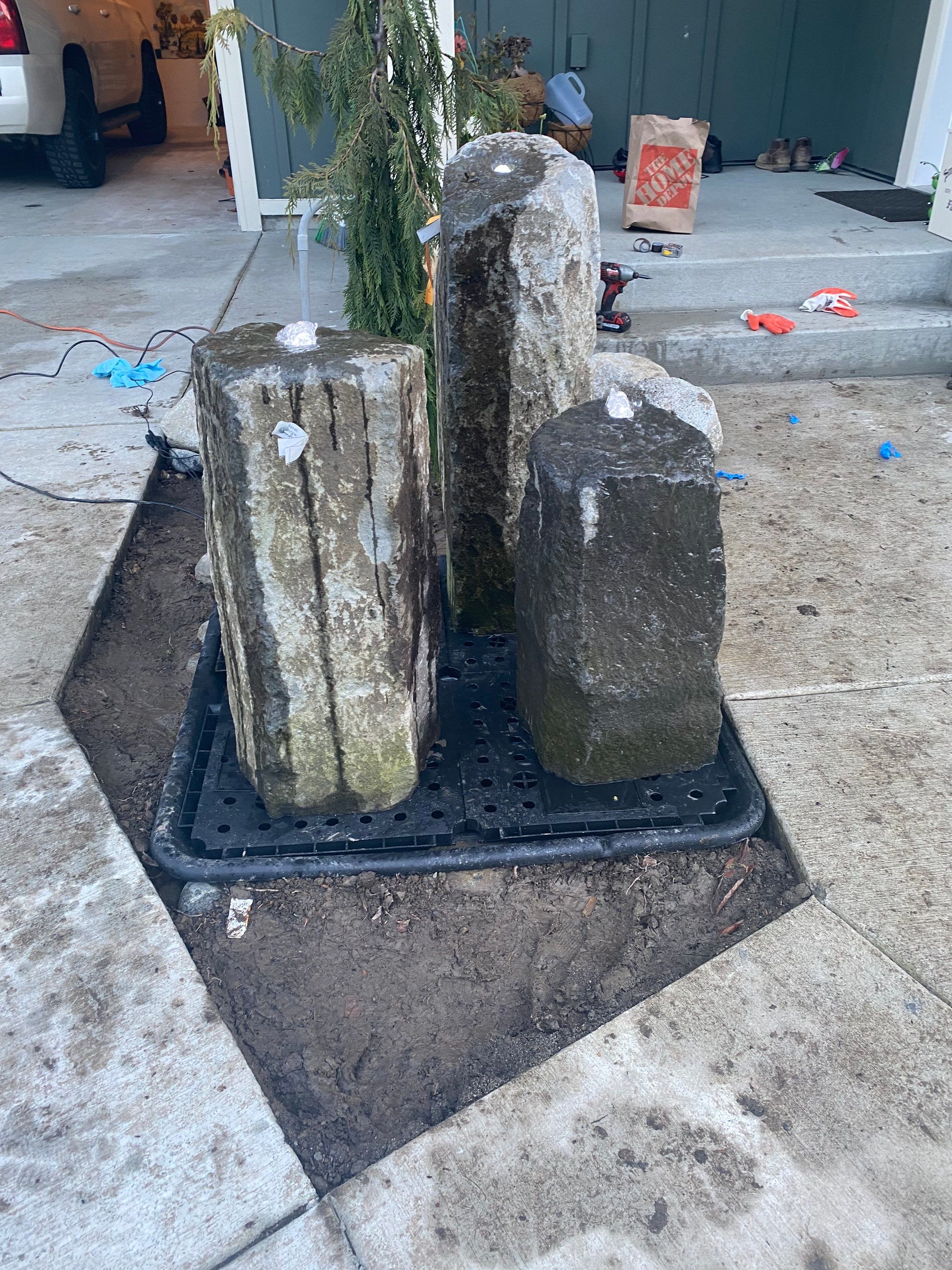 Patio Installation using Concrete, Retaining walls, and Turf install by Jireh Asphalt & Concrete Inc 