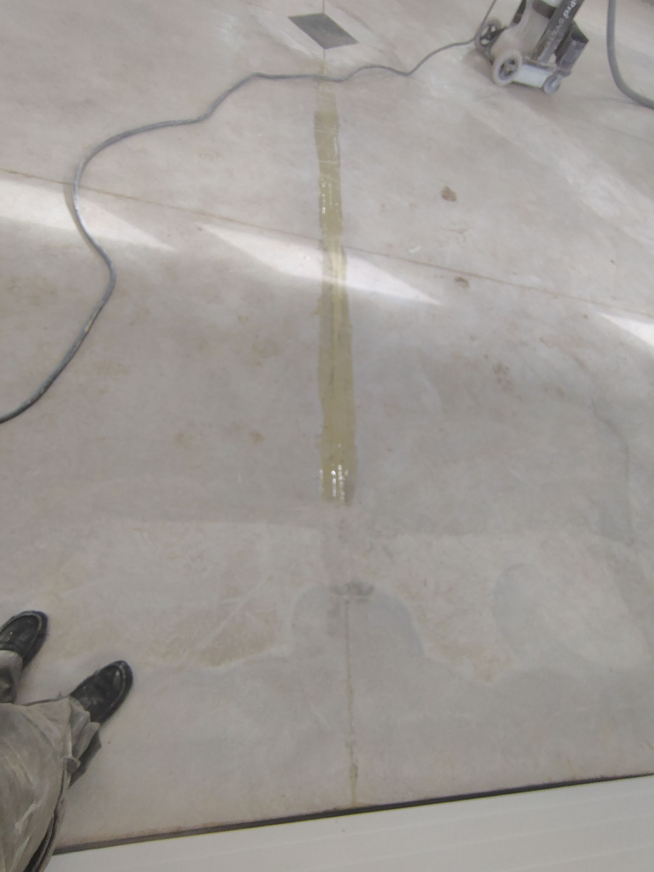 Speckled Epoxy Floor Coating for Large Shop in Rock Valley by Select Painting, Coatings & Garage Cabinets