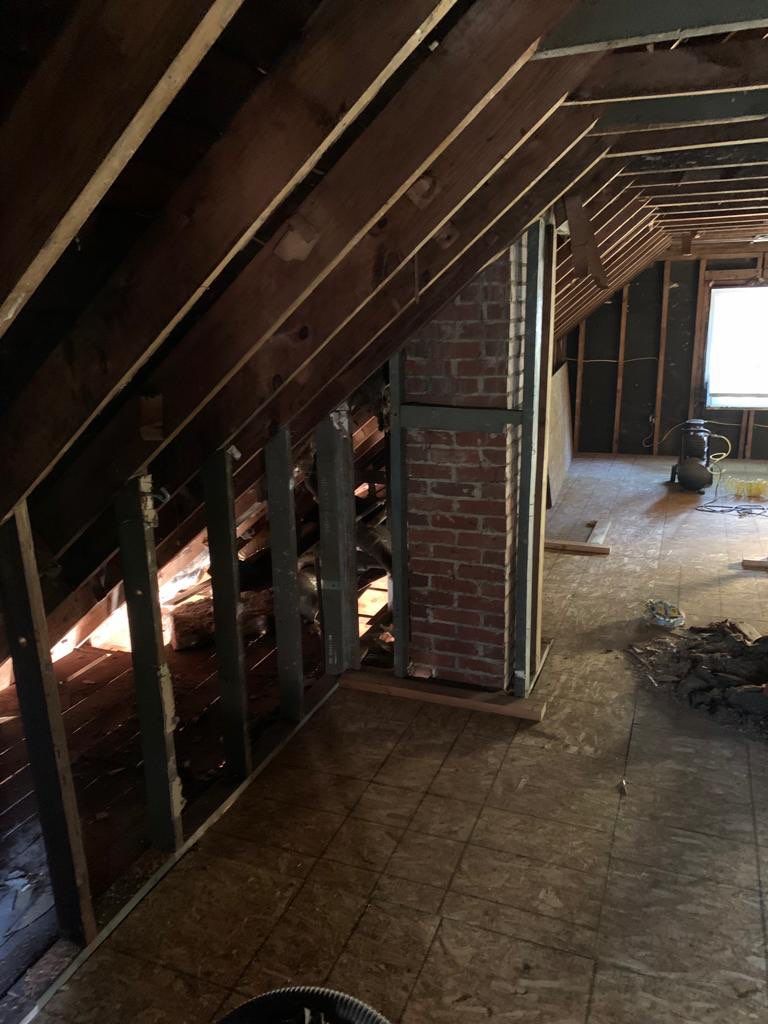 Room addition on the second floor of house by Greenspring Construction Services