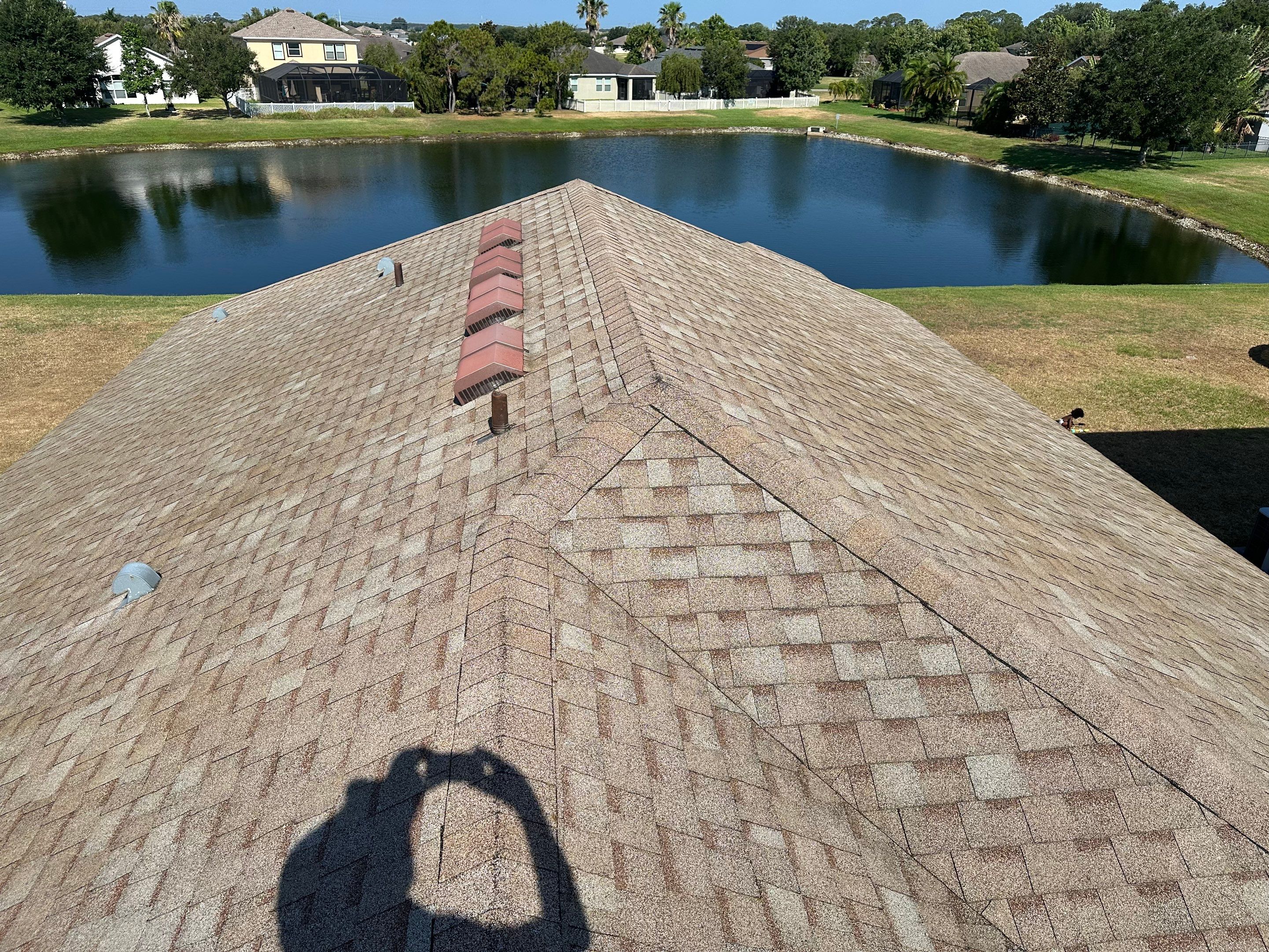 Asphalt Shingle Roof Soft Wash Cleaning & Concrete Pressure Washing in CopperStone Community, Parrish, FL by Sunshine AquaWash