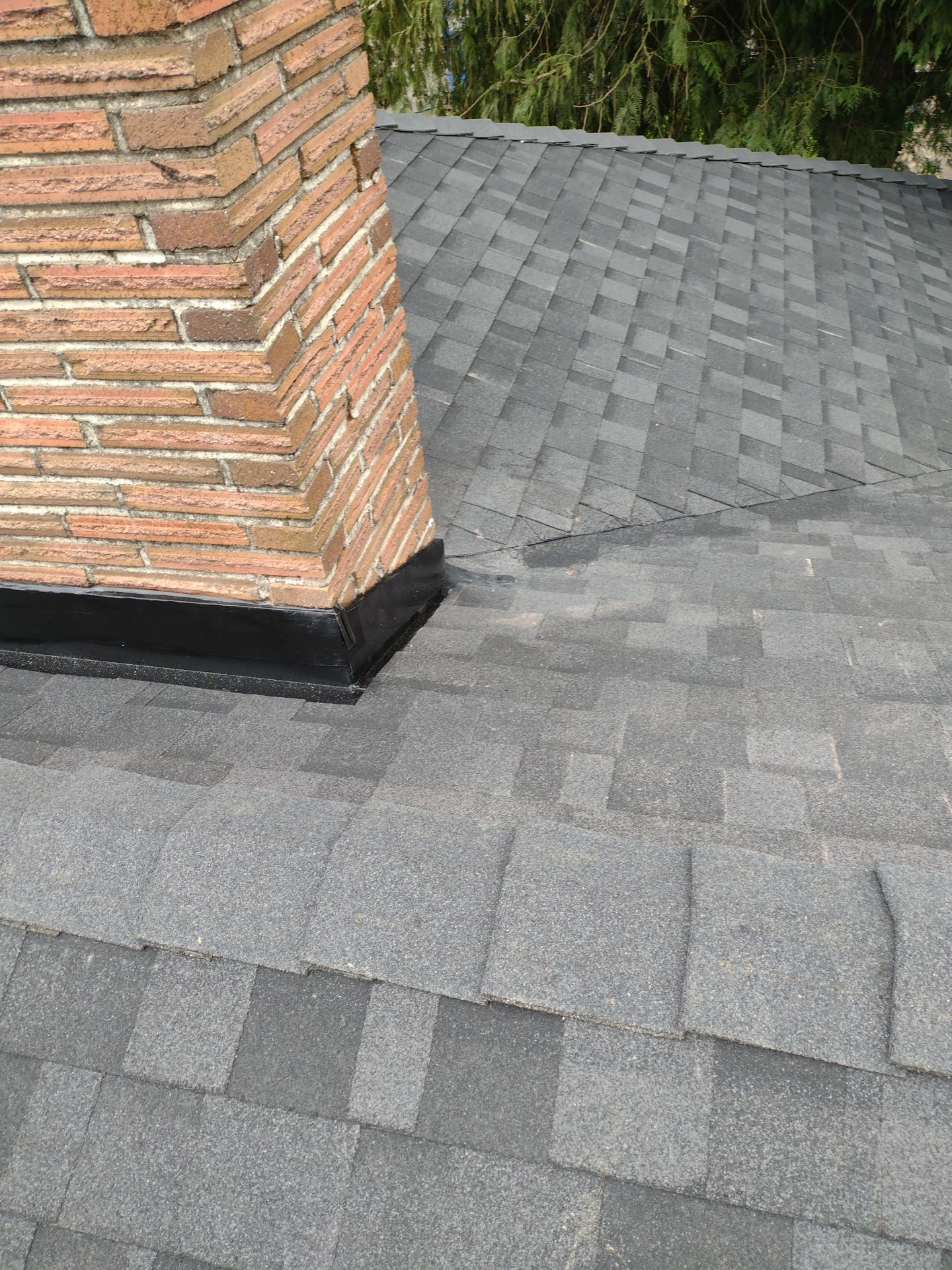 Residential Roofing Installation using IKO Dynasty (Color: Granite Black) by Orezona Building & Roofing Company, Inc.