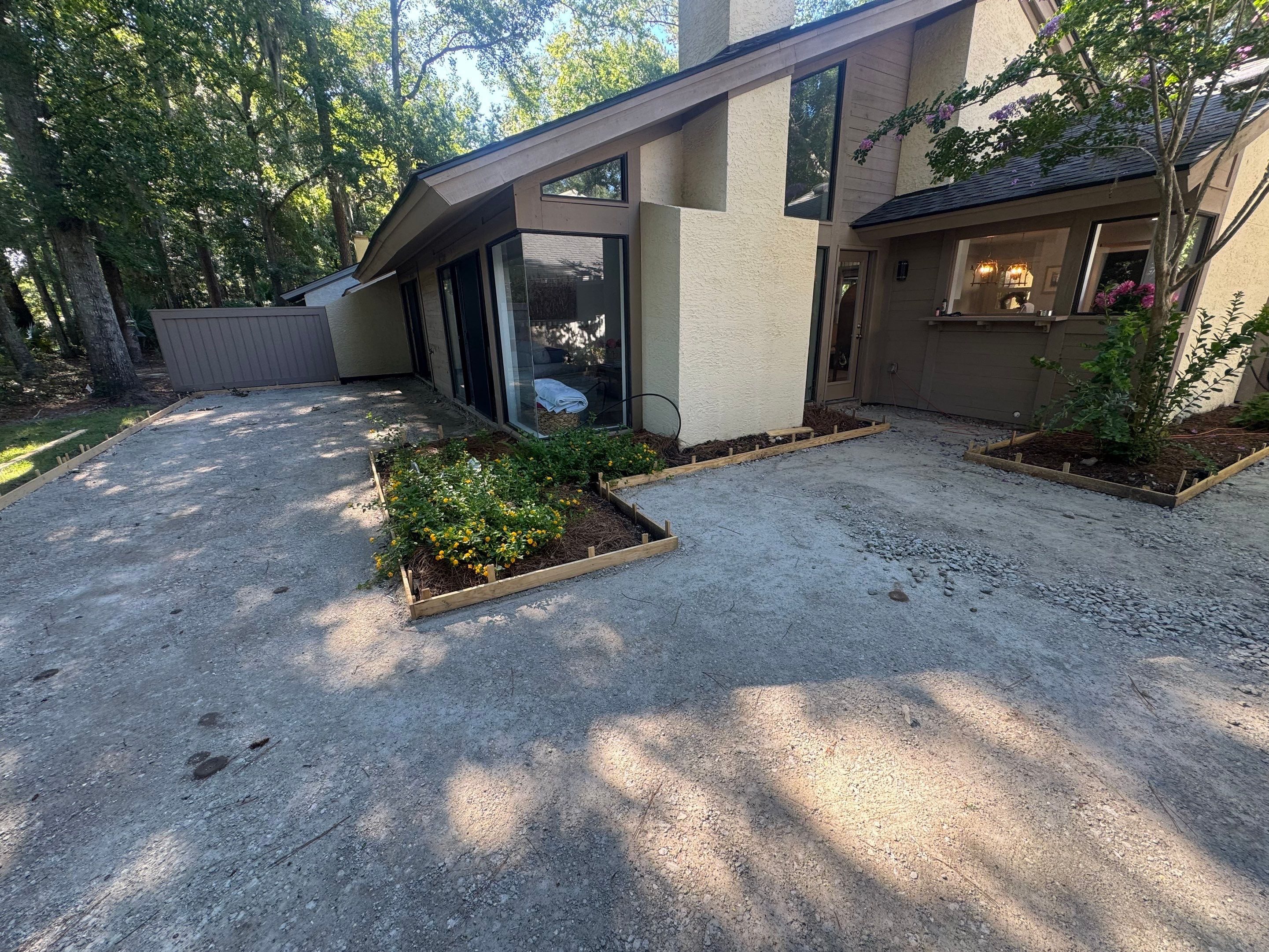 Custom Concrete Patio and Herringbone Paver Walkway in Hilton Head Island by Lowcountry Scapes, LLC