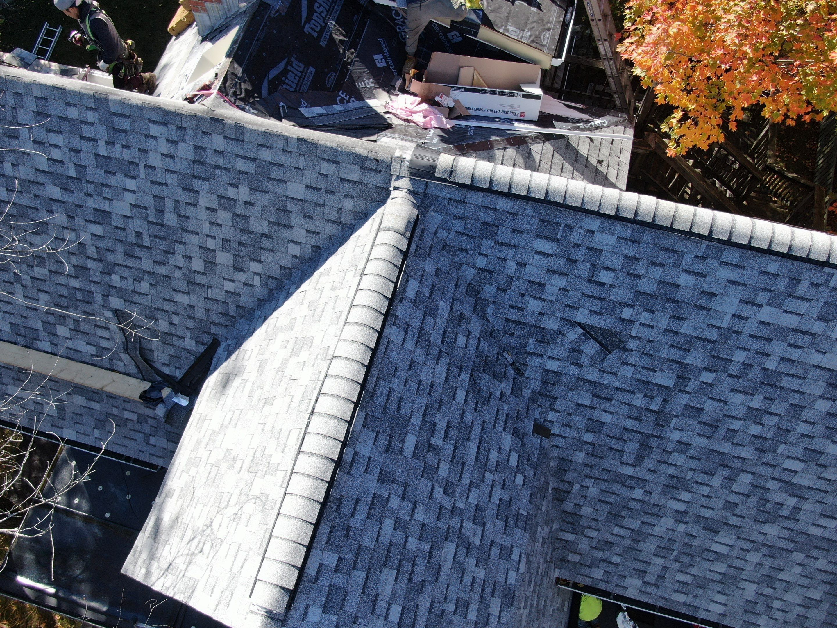 Full Roof & Porch EPDM Replacement with Skylight and Chimney Repairs by Mighty Dog Roofing of Greater Middlesex County