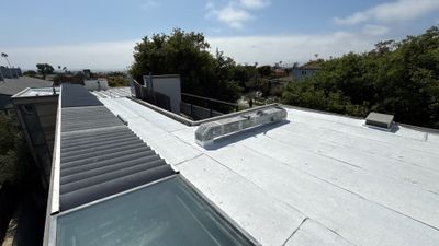 Residential Roofing Installation using Polyglass Torch Down Roofing System