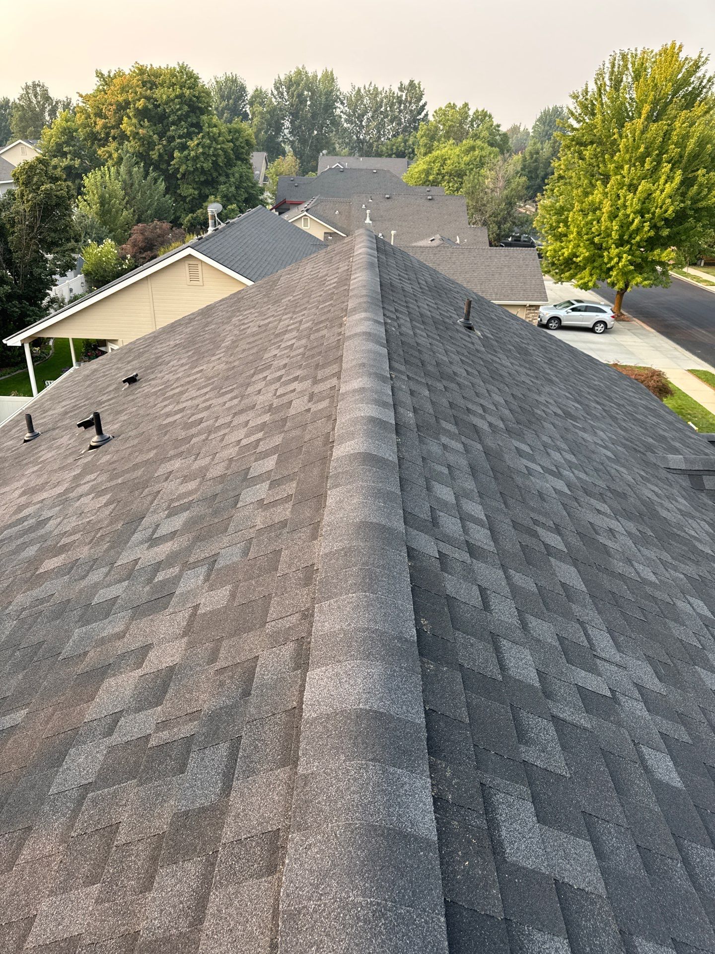 Meridian Residential Roof Replacement Using Dark Gray Architectural Shingles by Olive Roofing