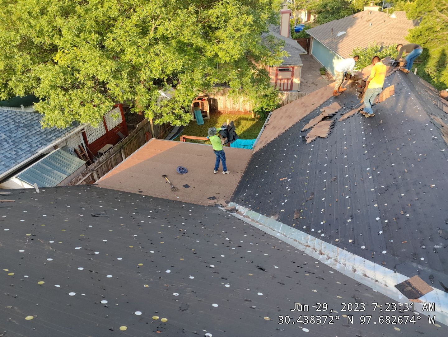 New Roof Installation Of IKO Dynasty Color Brownstone by DeZign Roofing & Exteriors