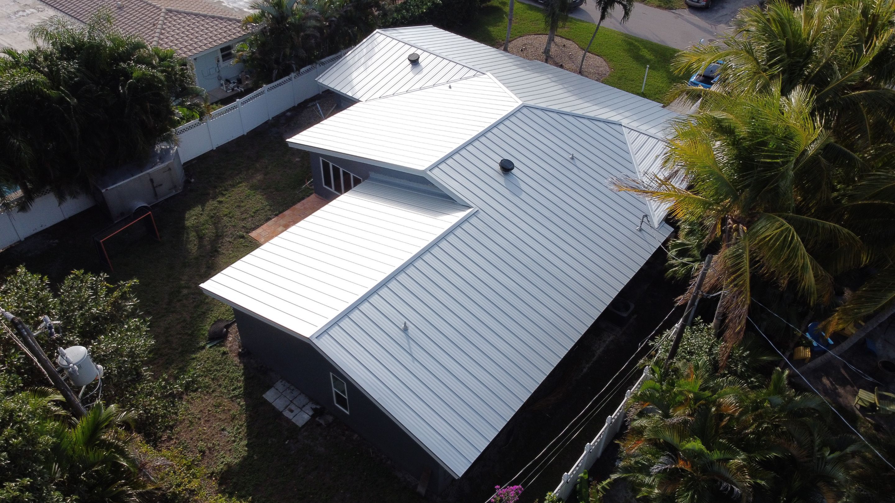 Residential Roofing Installation using 1" Nail strip metal roof by BLUES BROTHERS CONSTRUCTION CORP