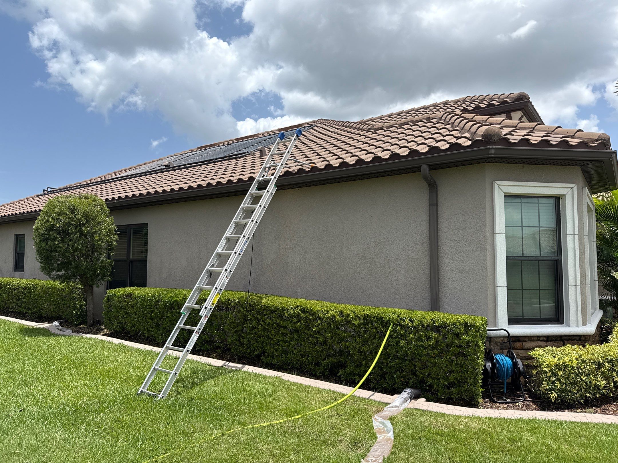Neighboring Tile Roof Cleaning with Gutter Runoff Control – Palmetto, FL by Sunshine AquaWash